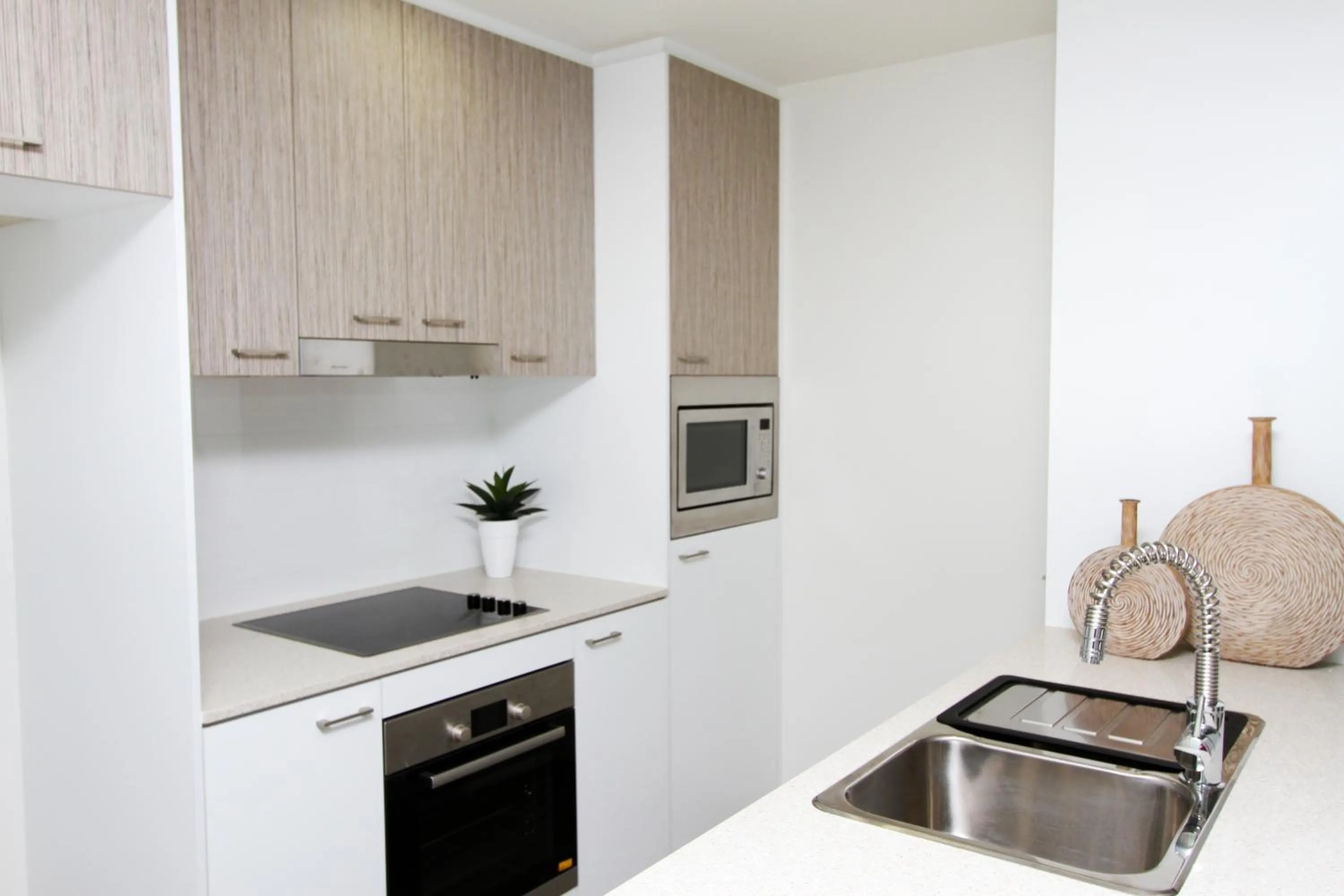 Kitchen or kitchenette in Canberra Rex Hotel