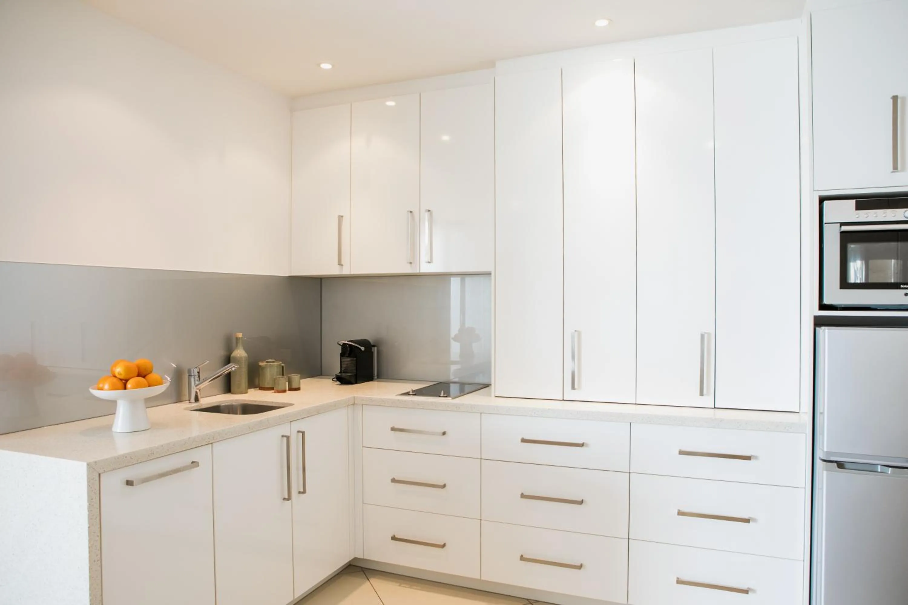 Kitchen or kitchenette in On The Beach Noosa Resort