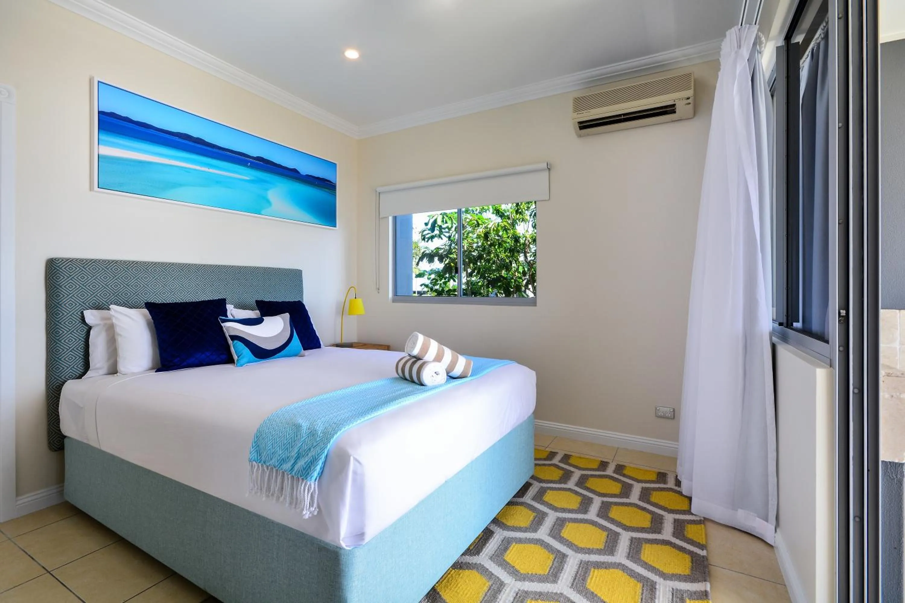 Bed in Hamilton Island Holiday Homes