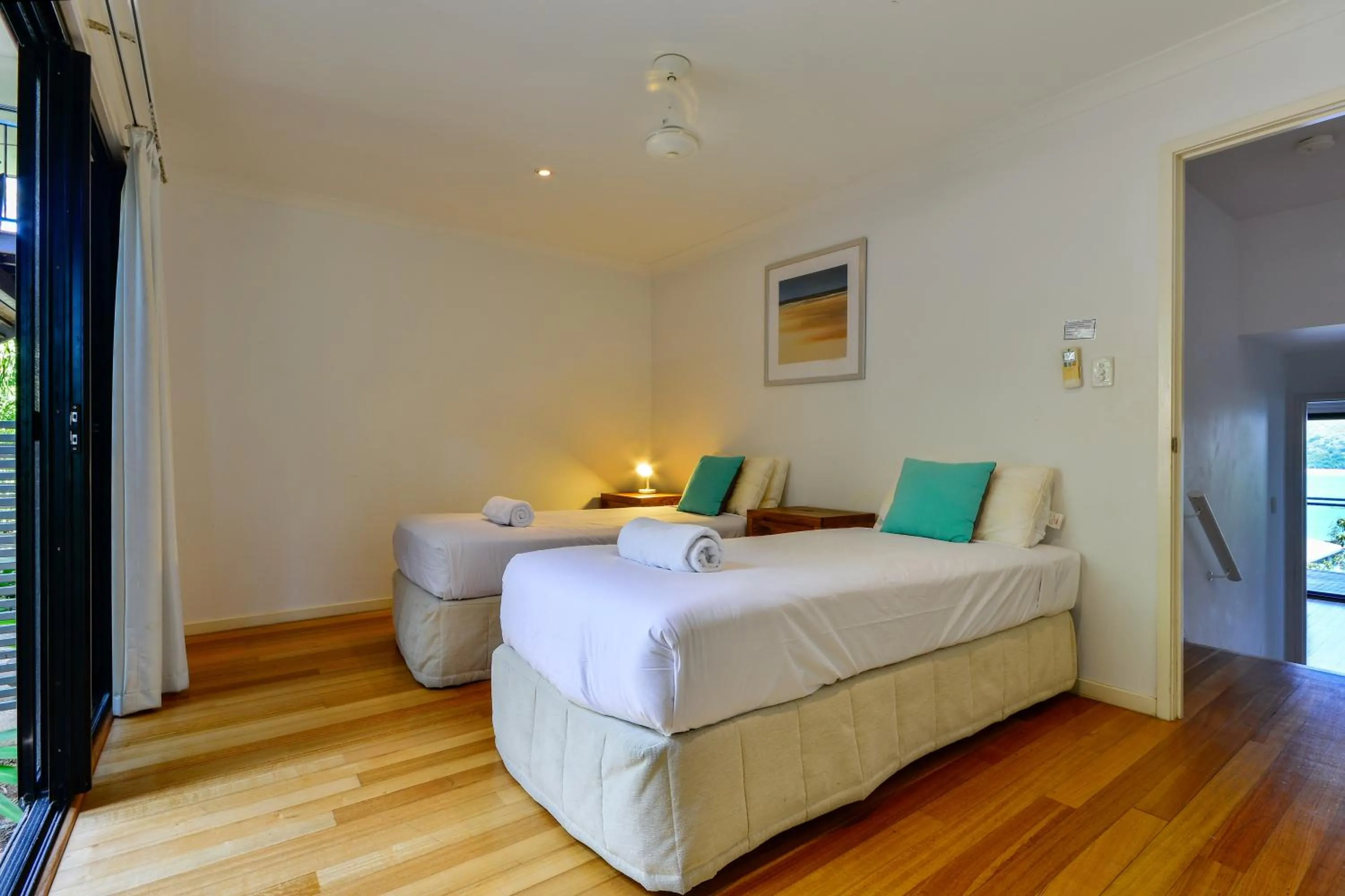 Bed in Hamilton Island Holiday Homes