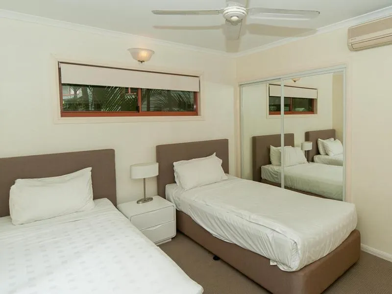 Bed in Hamilton Island Holiday Homes