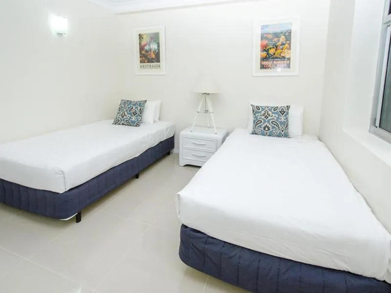 Bed in Hamilton Island Holiday Homes