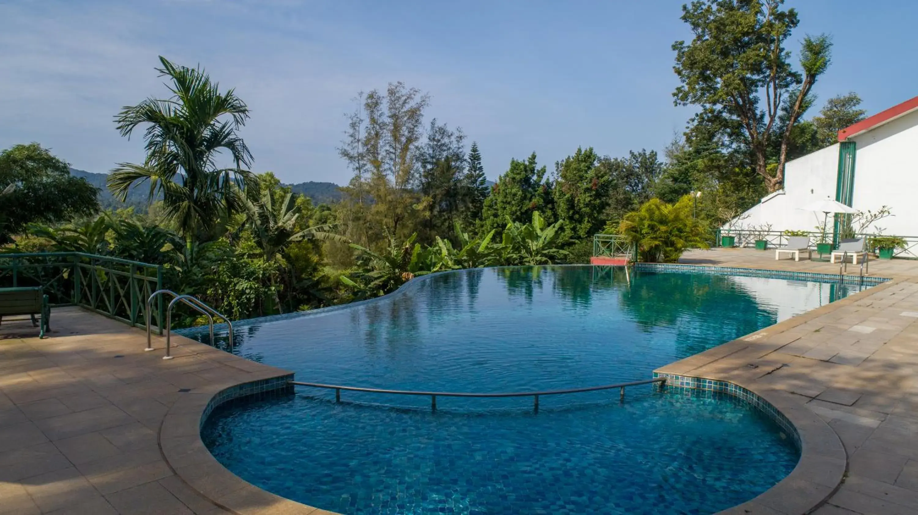 Swimming pool in Amritara Ambatty Greens Resort Swimming pool in Amritara Ambatty Greens Resort