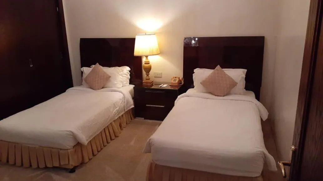 Bed in Al Gosaibi Hotel - Villa