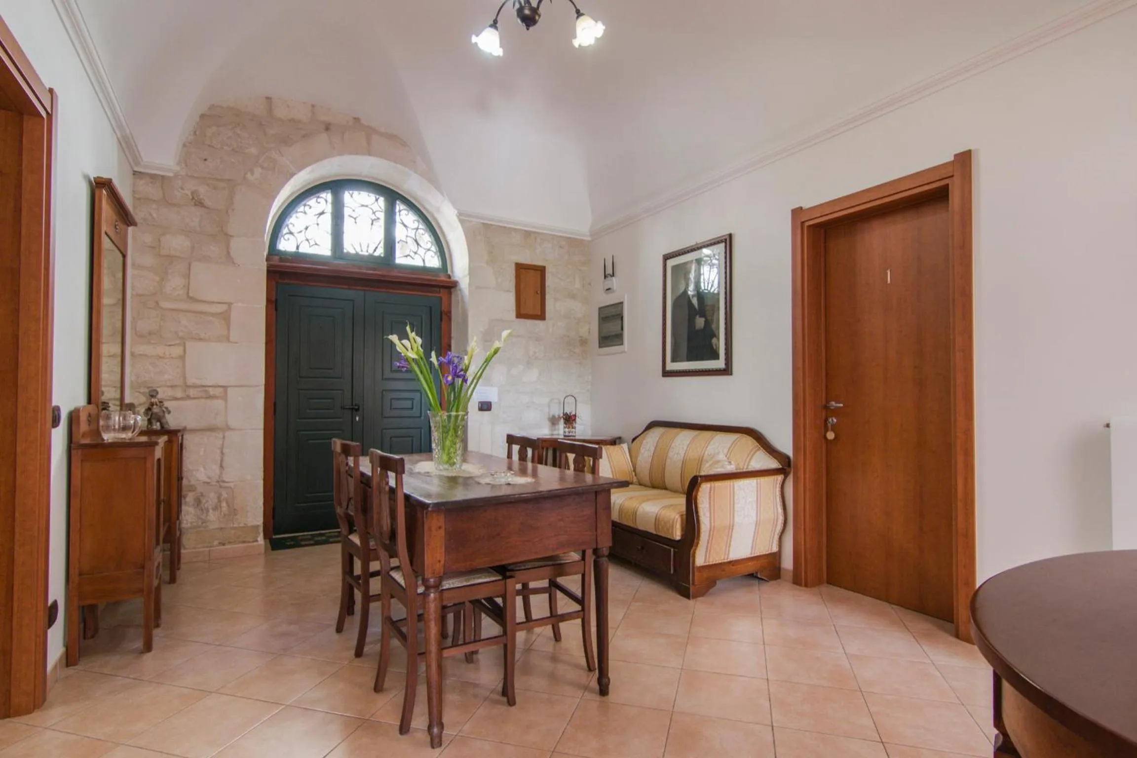 Communal lounge/ TV room in B&B Il Giardino Dei Mandarini