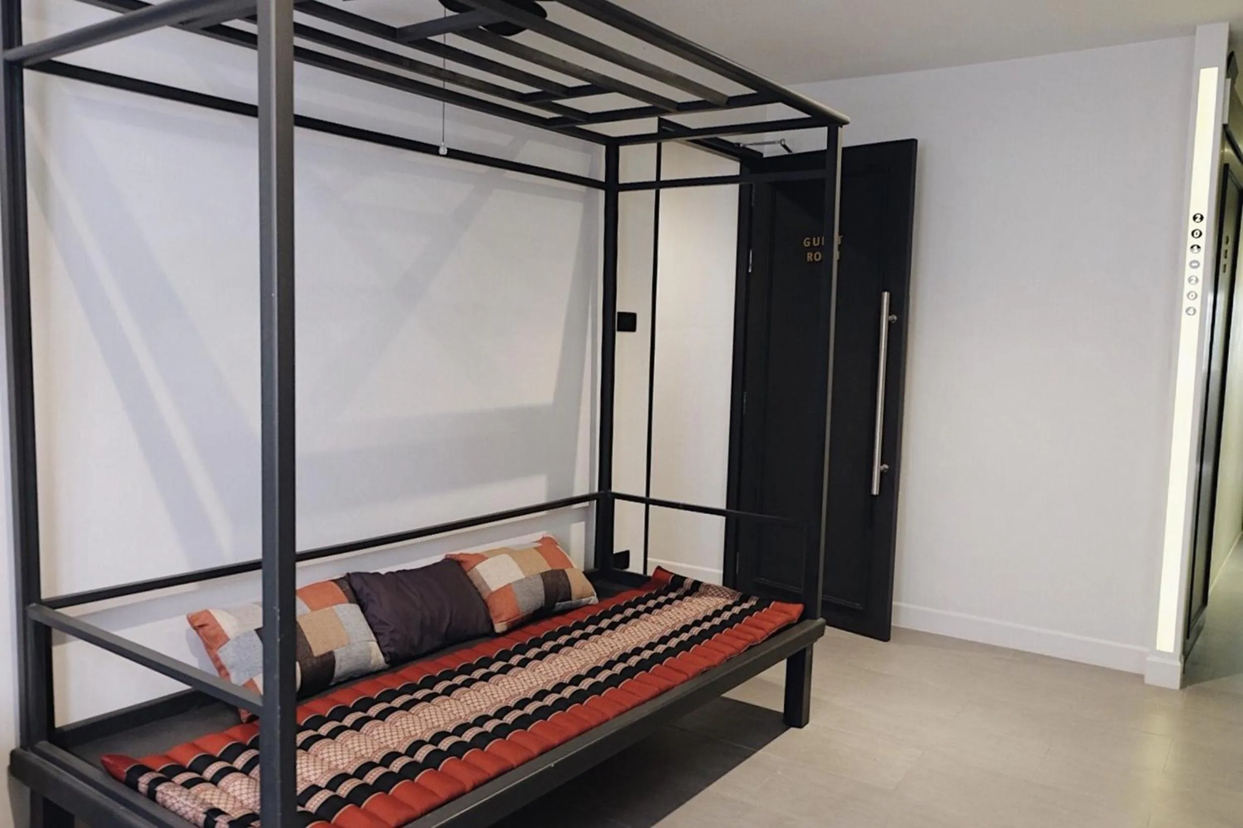 Seating area, Bed in Four Sisters Homestay