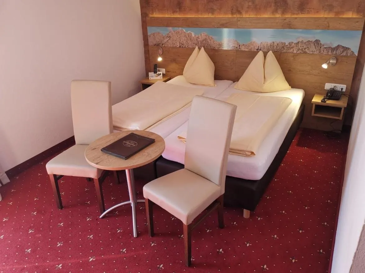 Bedroom in Hotel Alpenhof