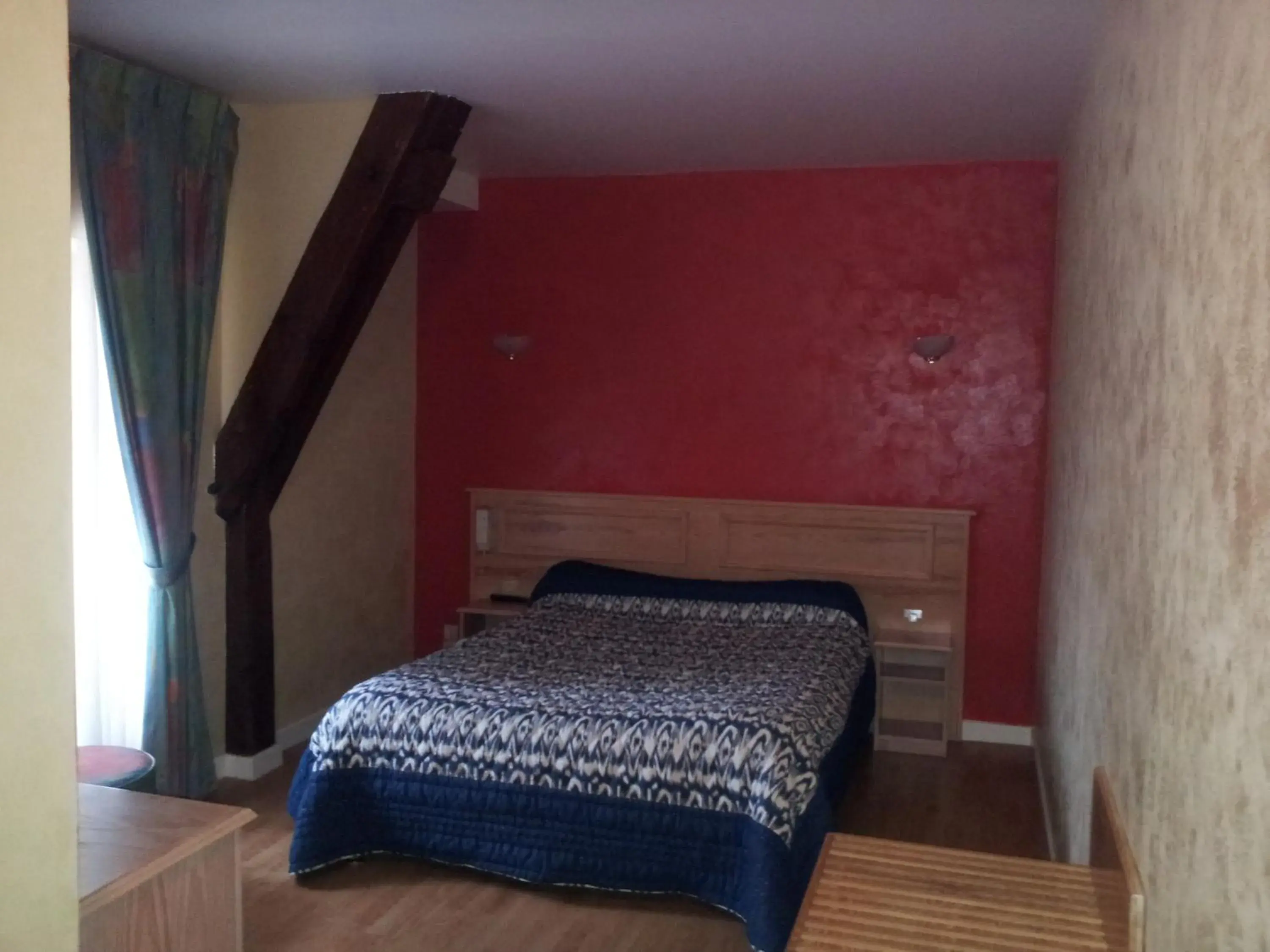 Bed in Maison Legate "Hôtel Le Baudiere & Spa" Bed in Maison Legate "Hôtel Le Baudiere & Spa"