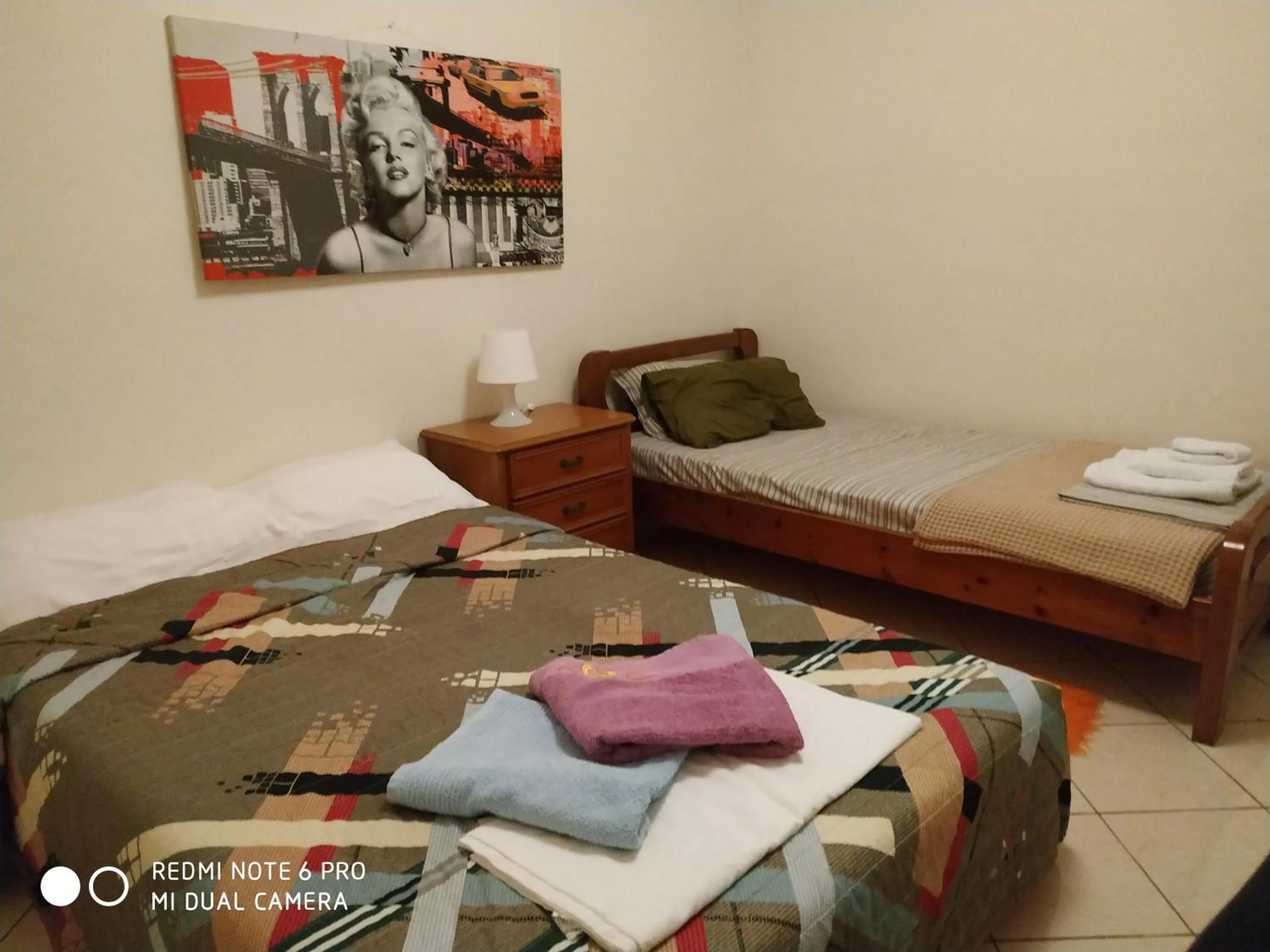 Bed in Stavros Apartments