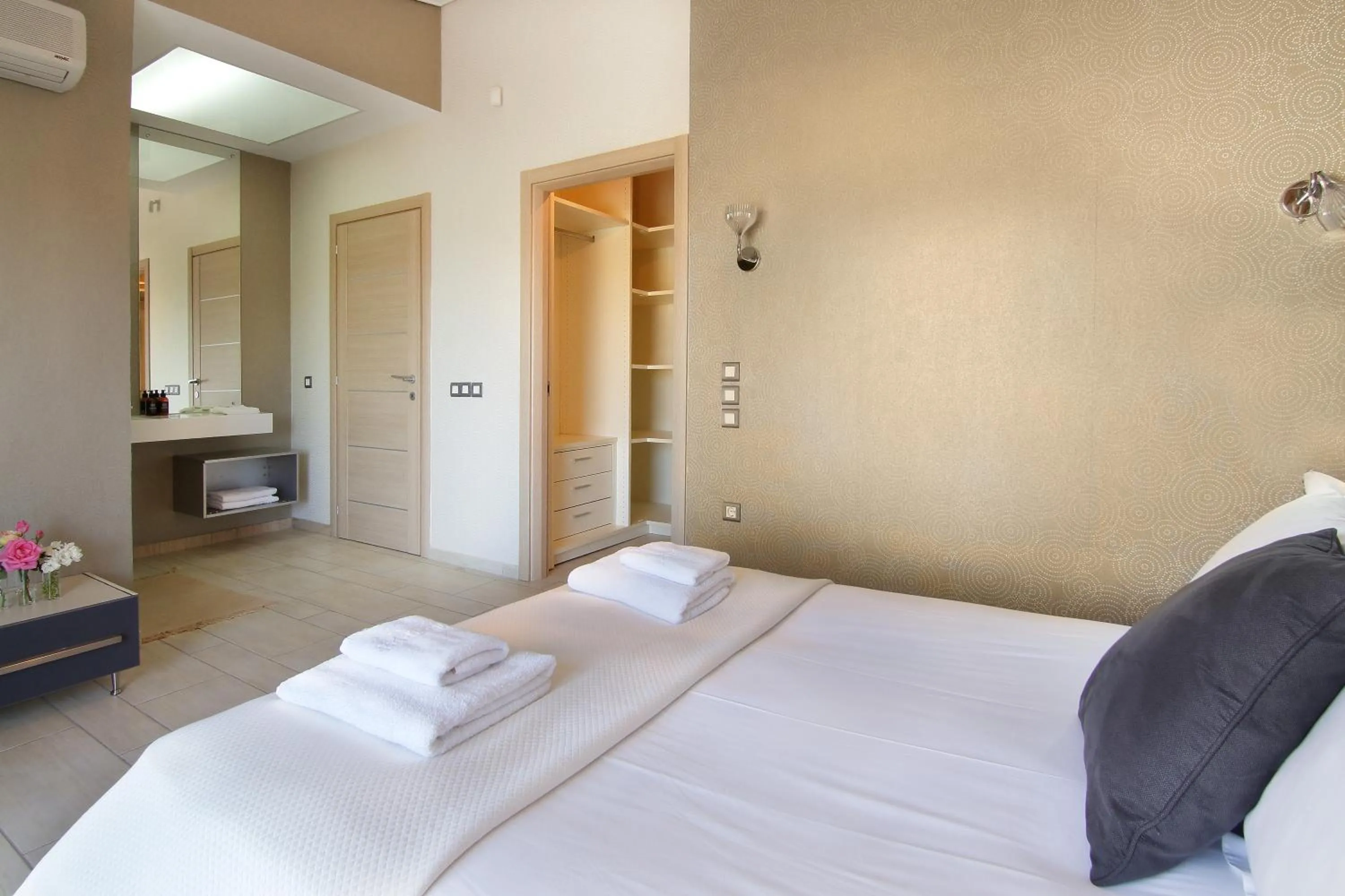 Bed in Adam & Eve Villas