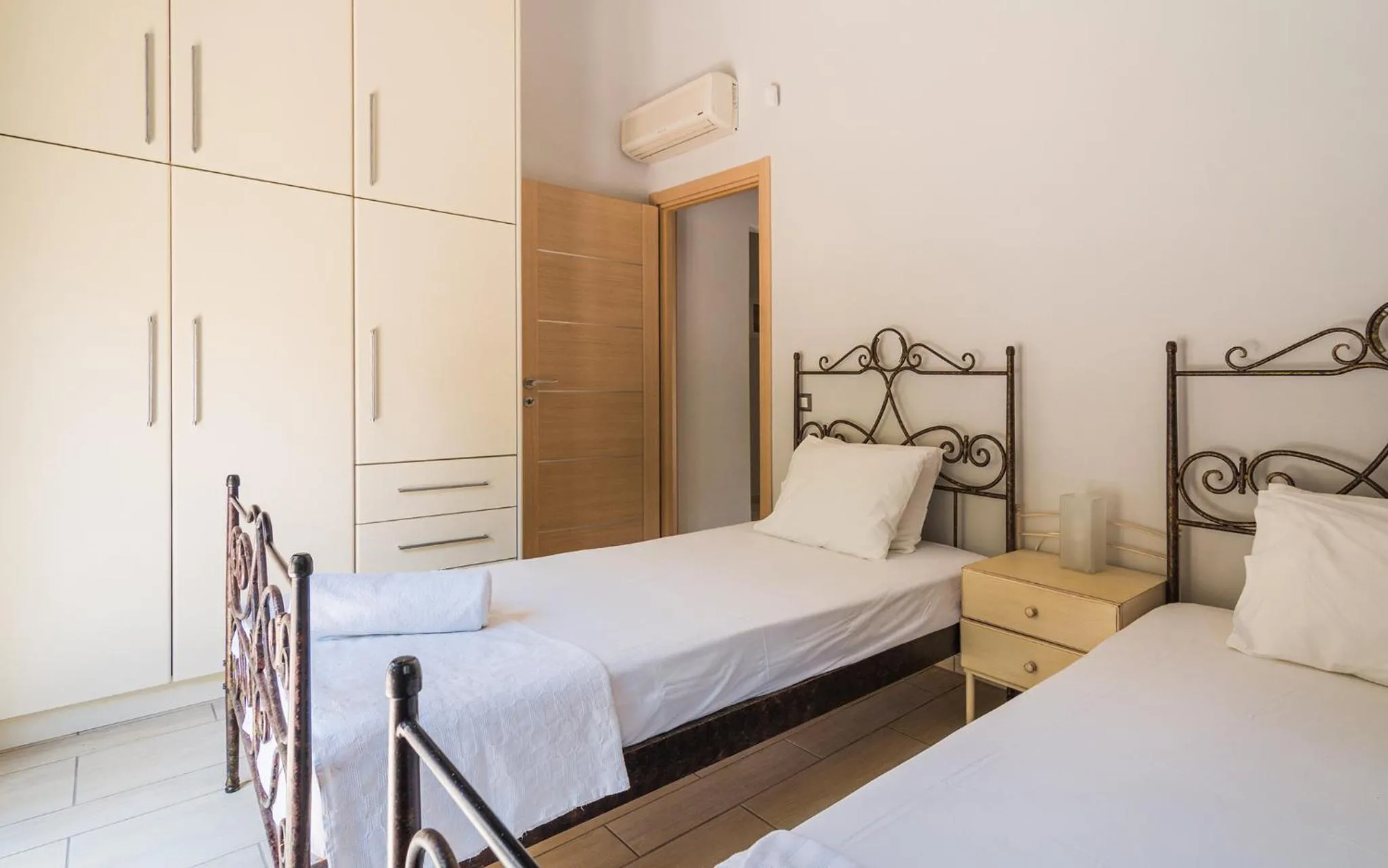 Bed in Adam & Eve Villas