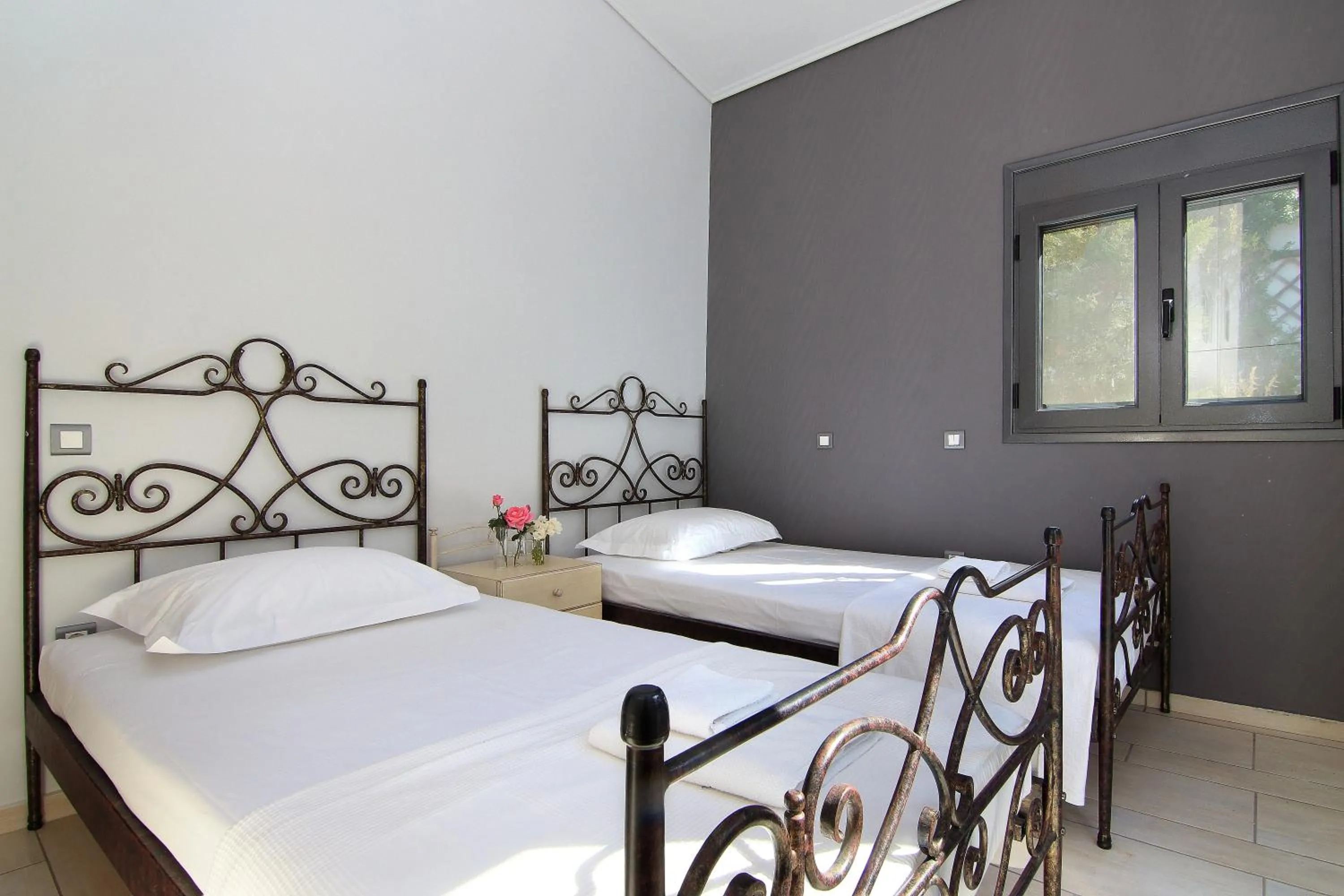 Bed in Adam & Eve Villas