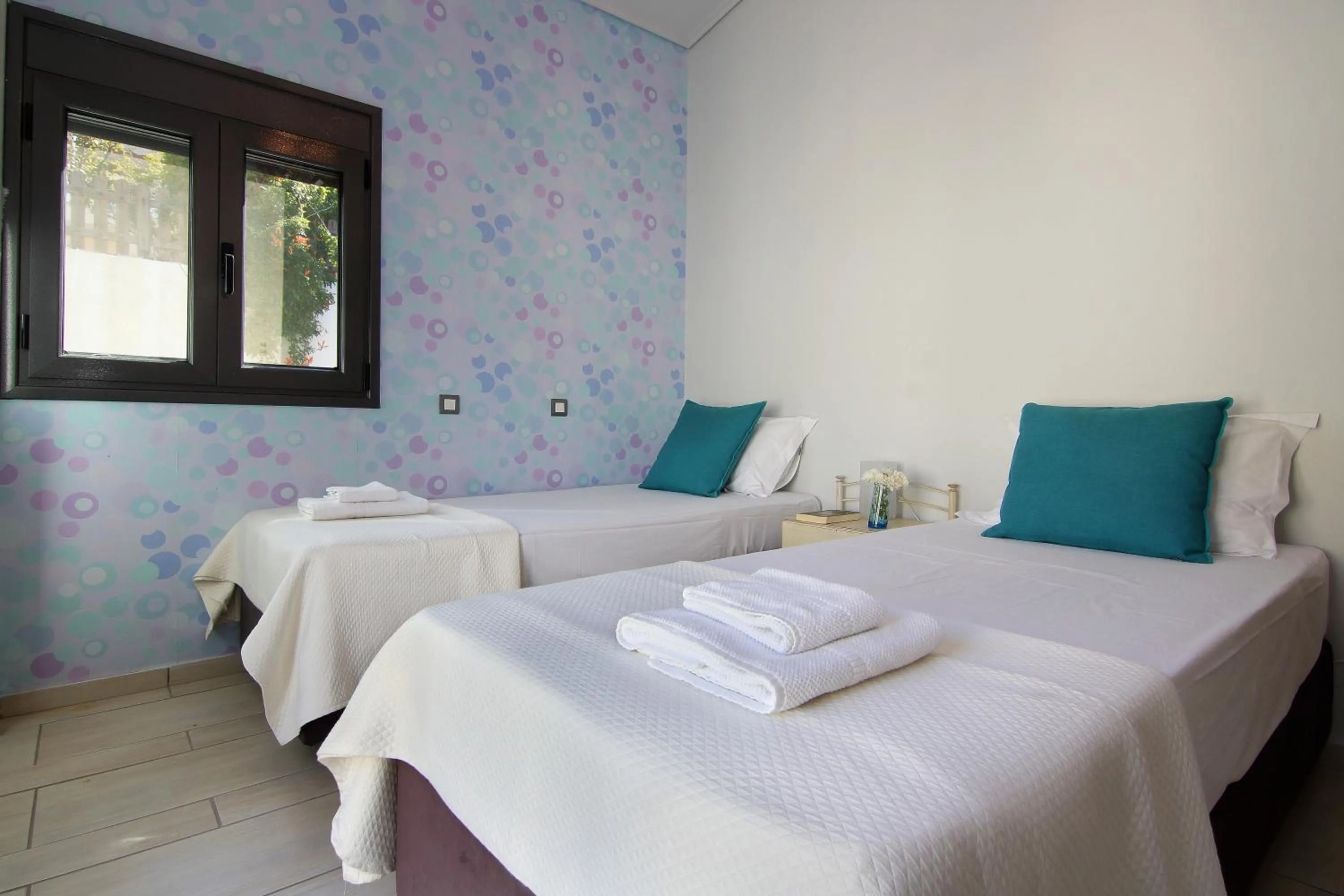 Bed in Adam & Eve Villas