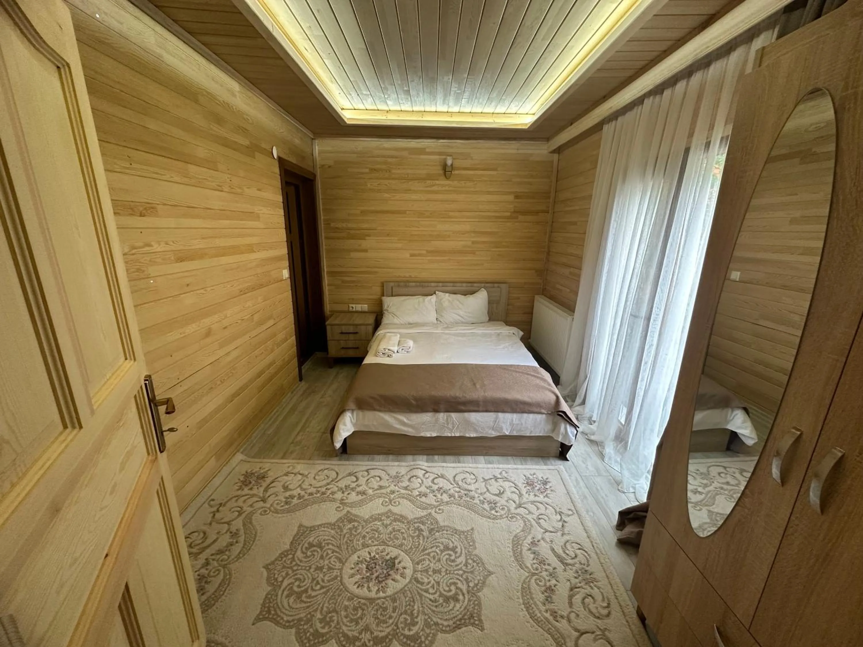 Bed in Haros Suite Hotel