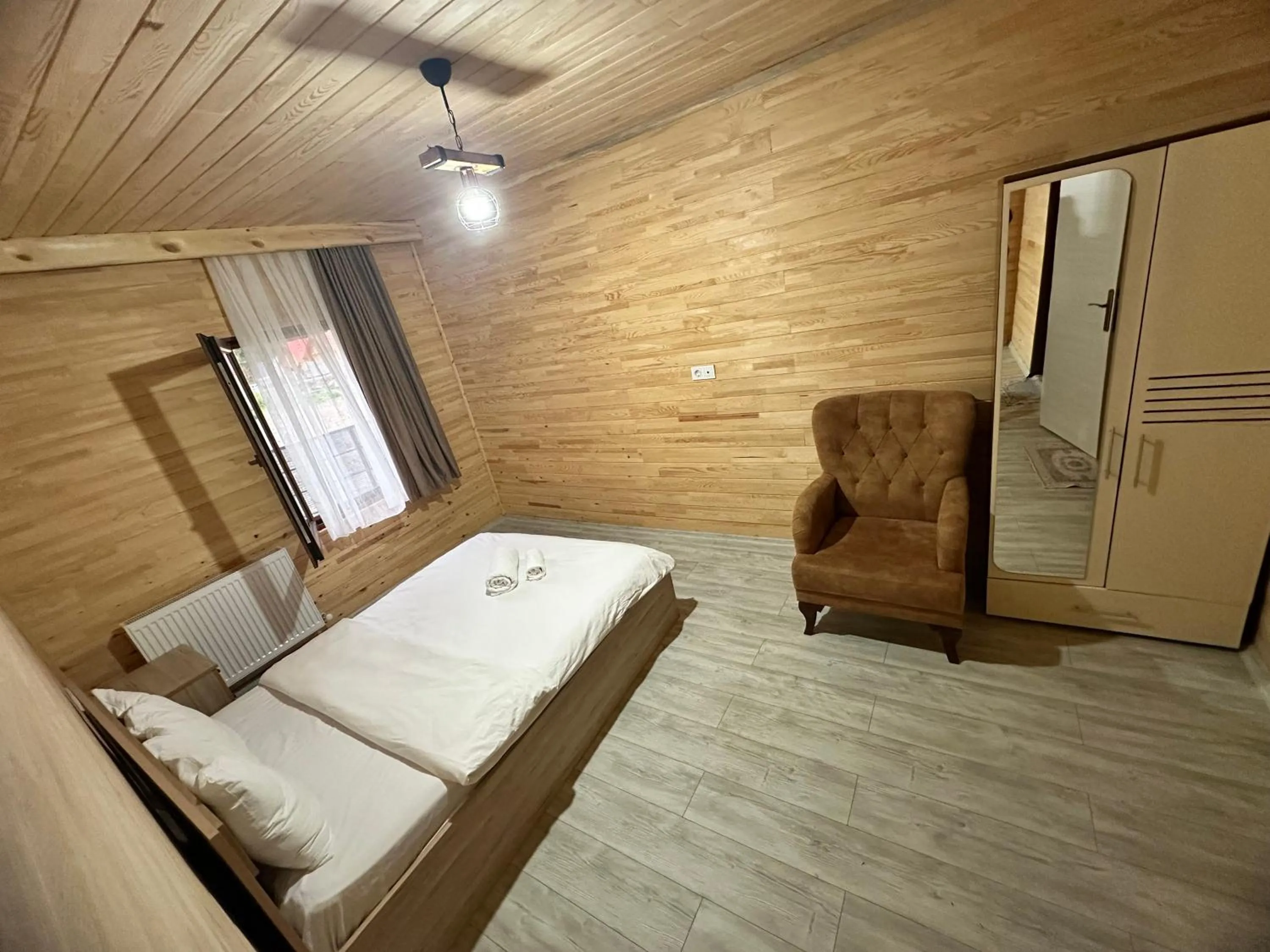 Bed in Haros Suite Hotel