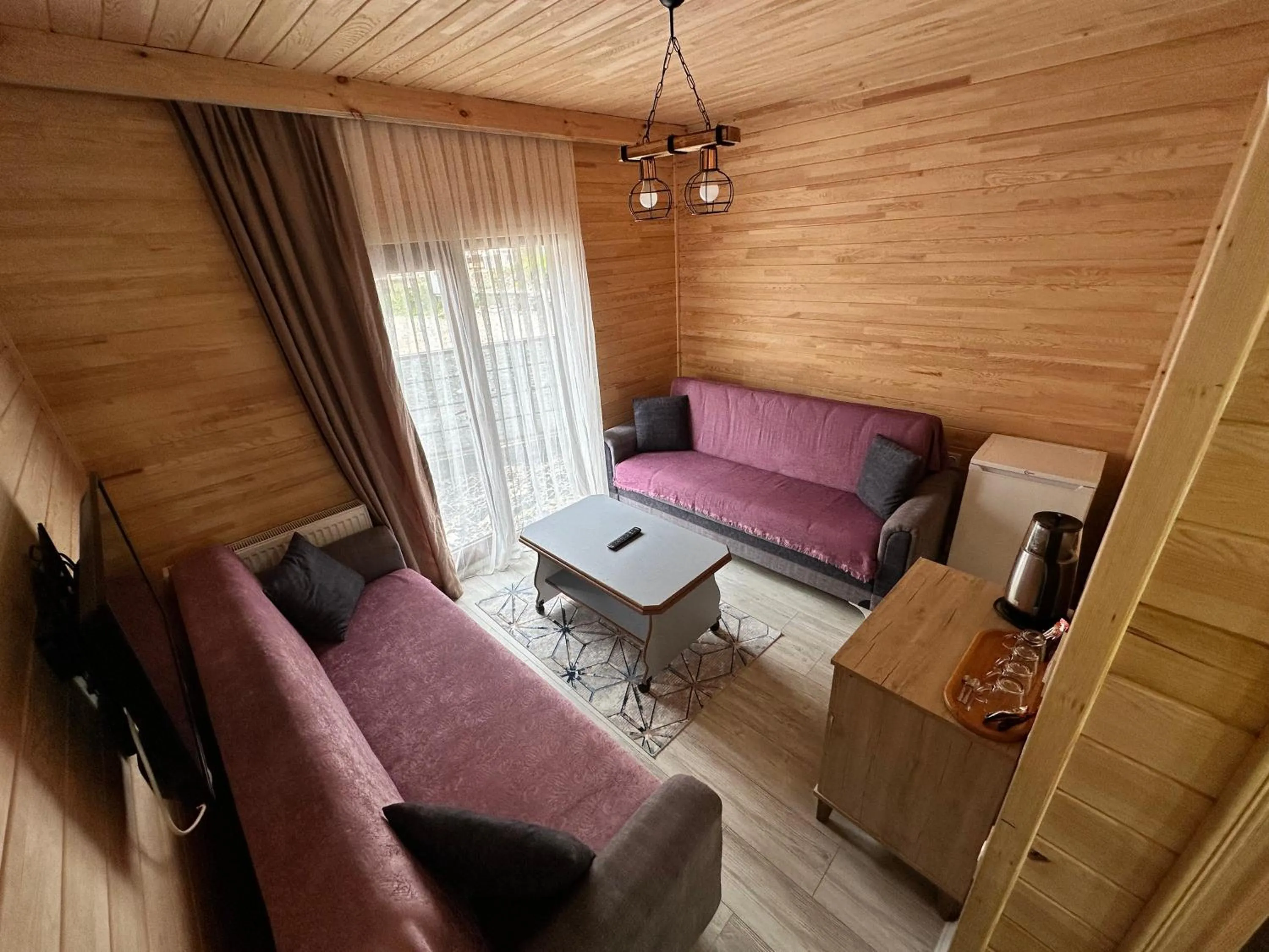 Living room in Haros Suite Hotel