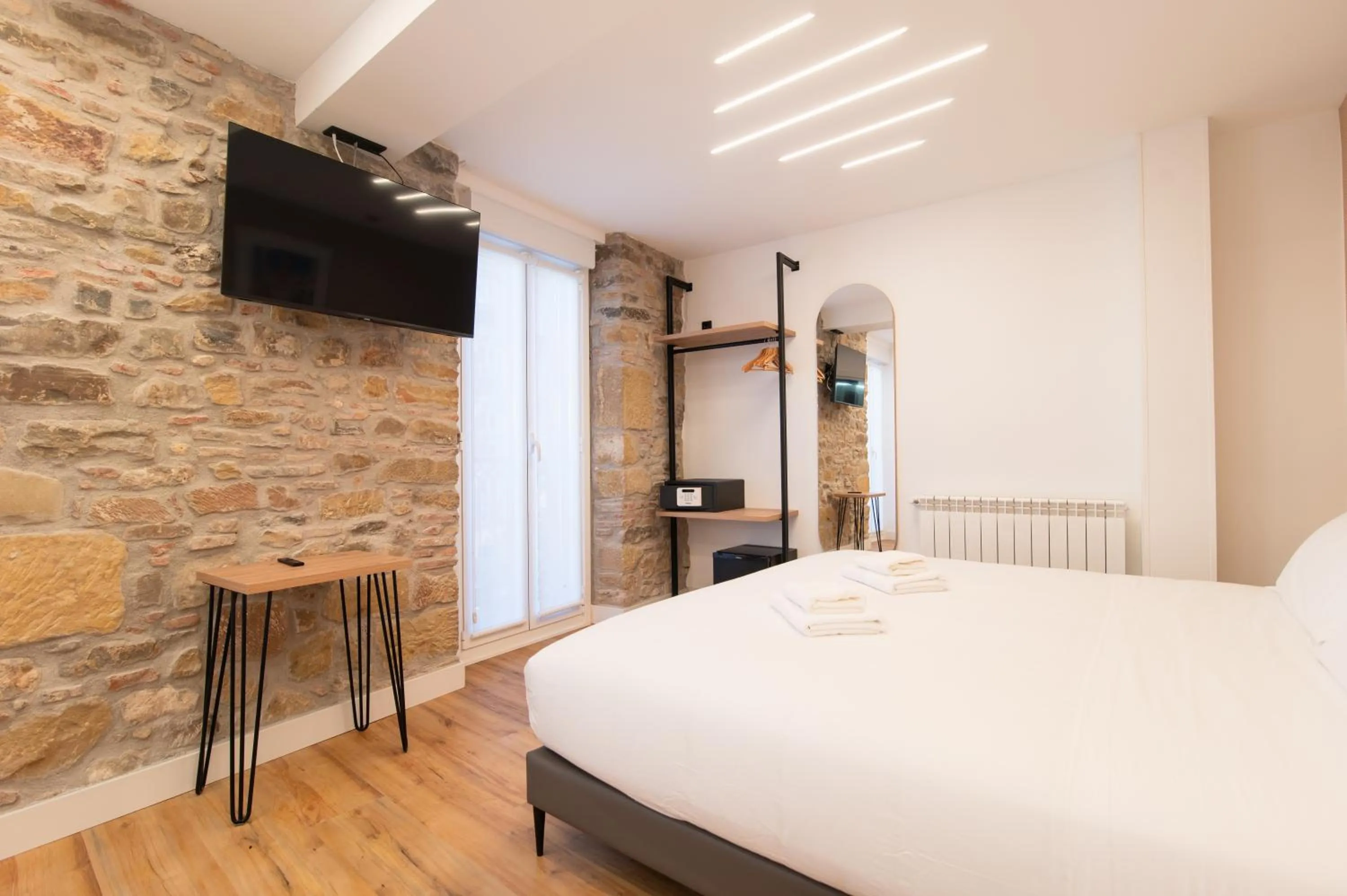 Bed in Boulevard Roomss