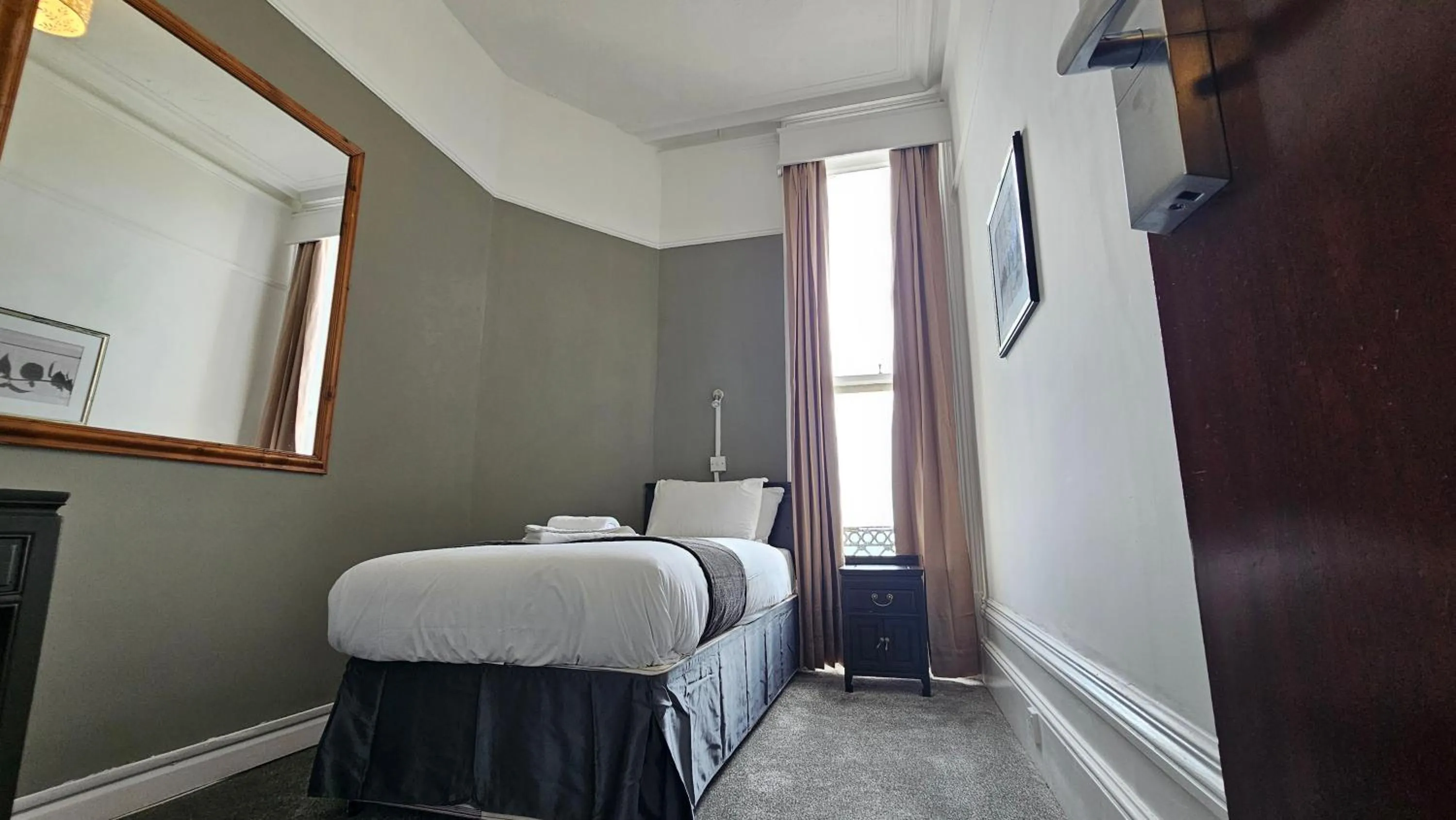 Bed in The Strand Hotel