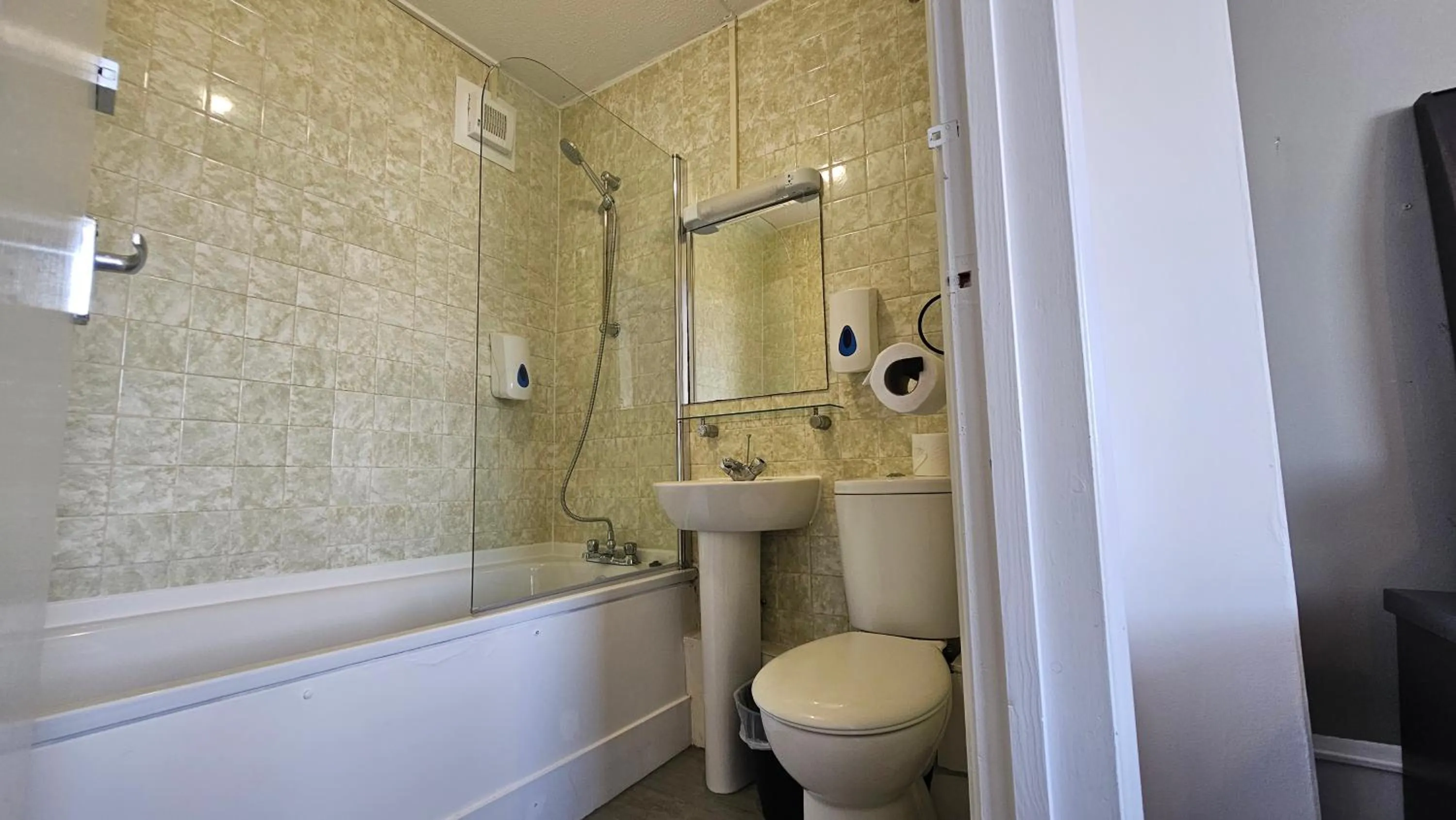 Bathroom in The Strand Hotel