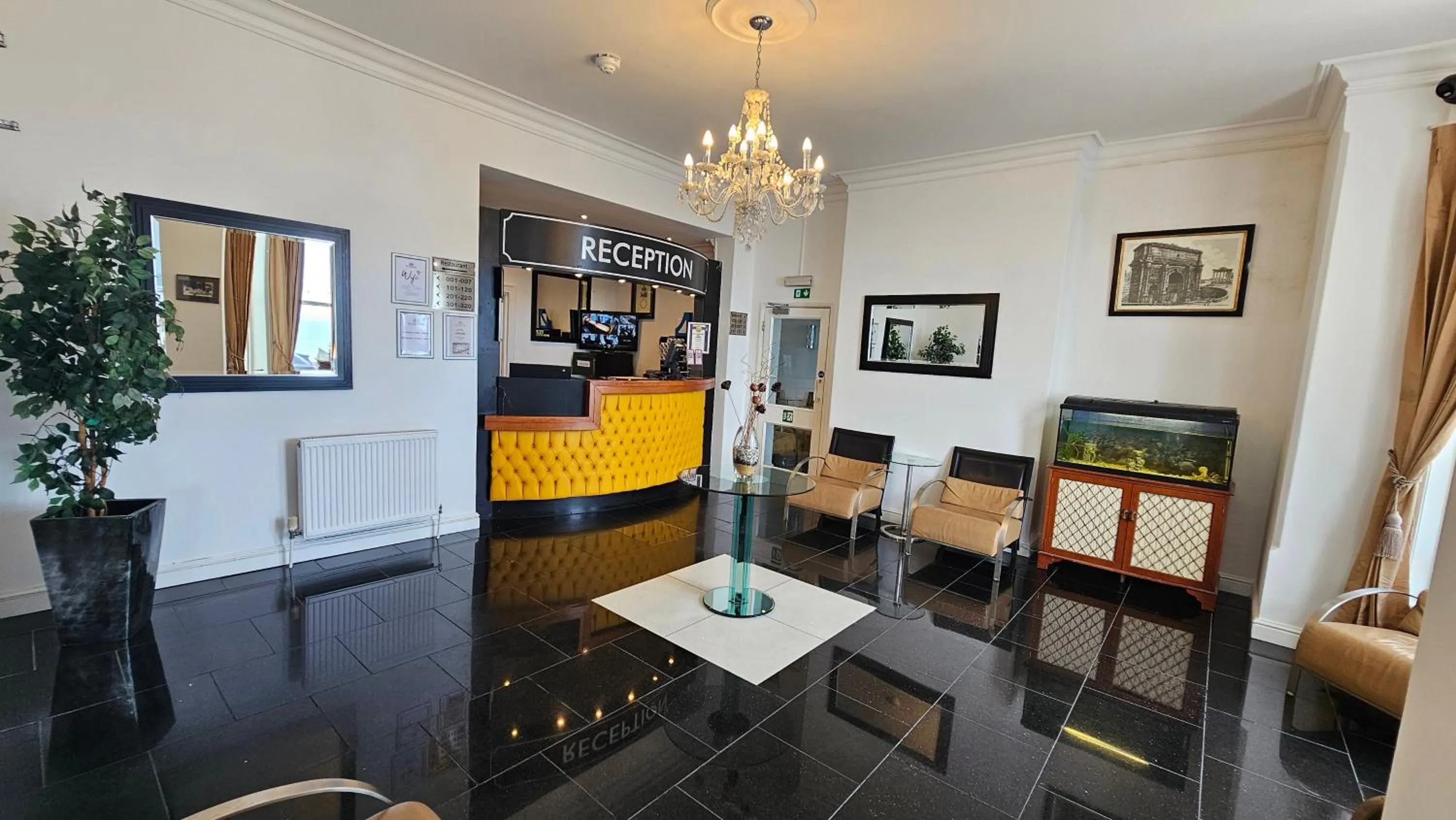 Lobby or reception in The Strand Hotel