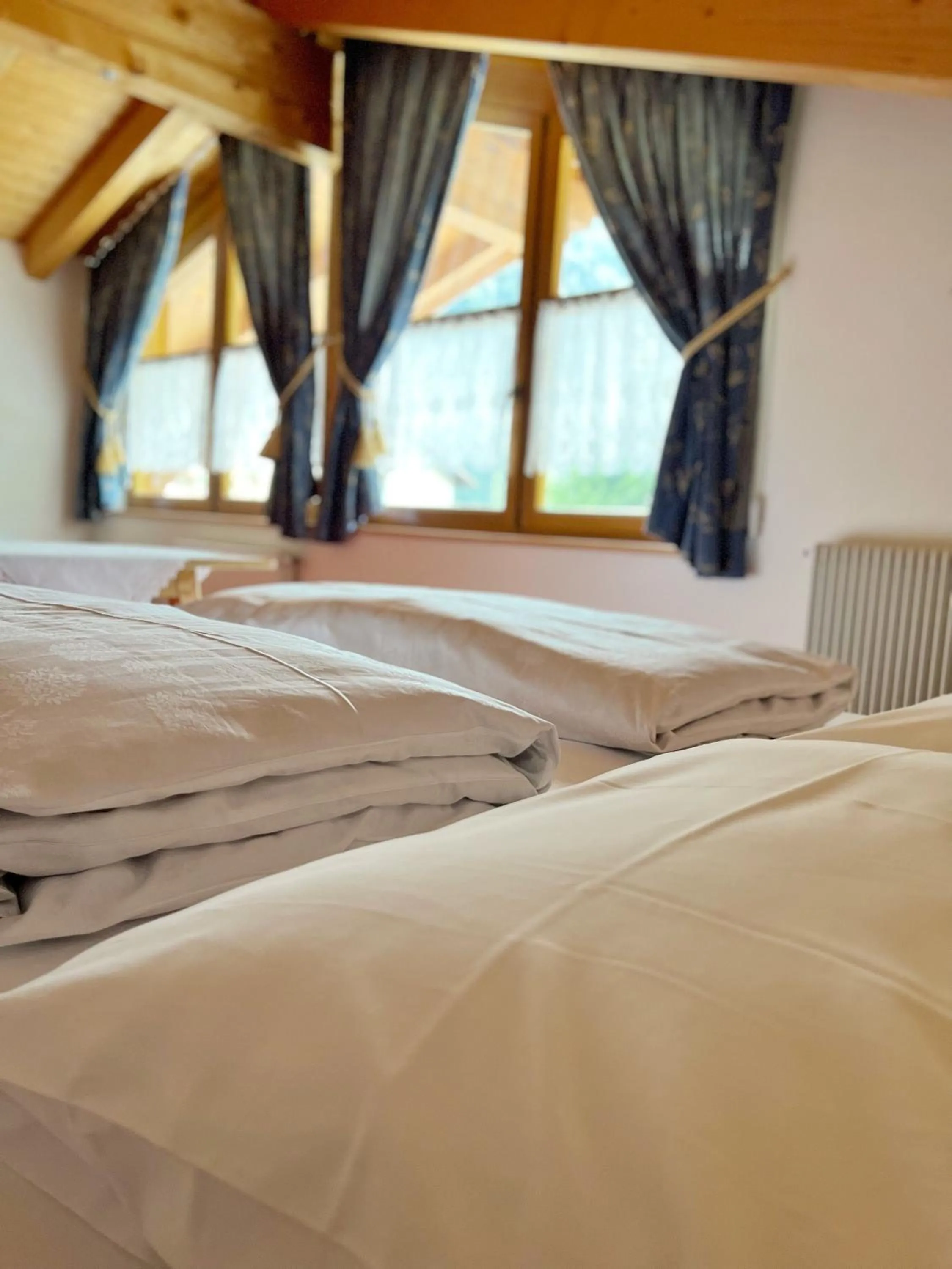 Bed in Zur Brücke apartments and rooms - Your home in heart of South Tyrol, with Brixencard