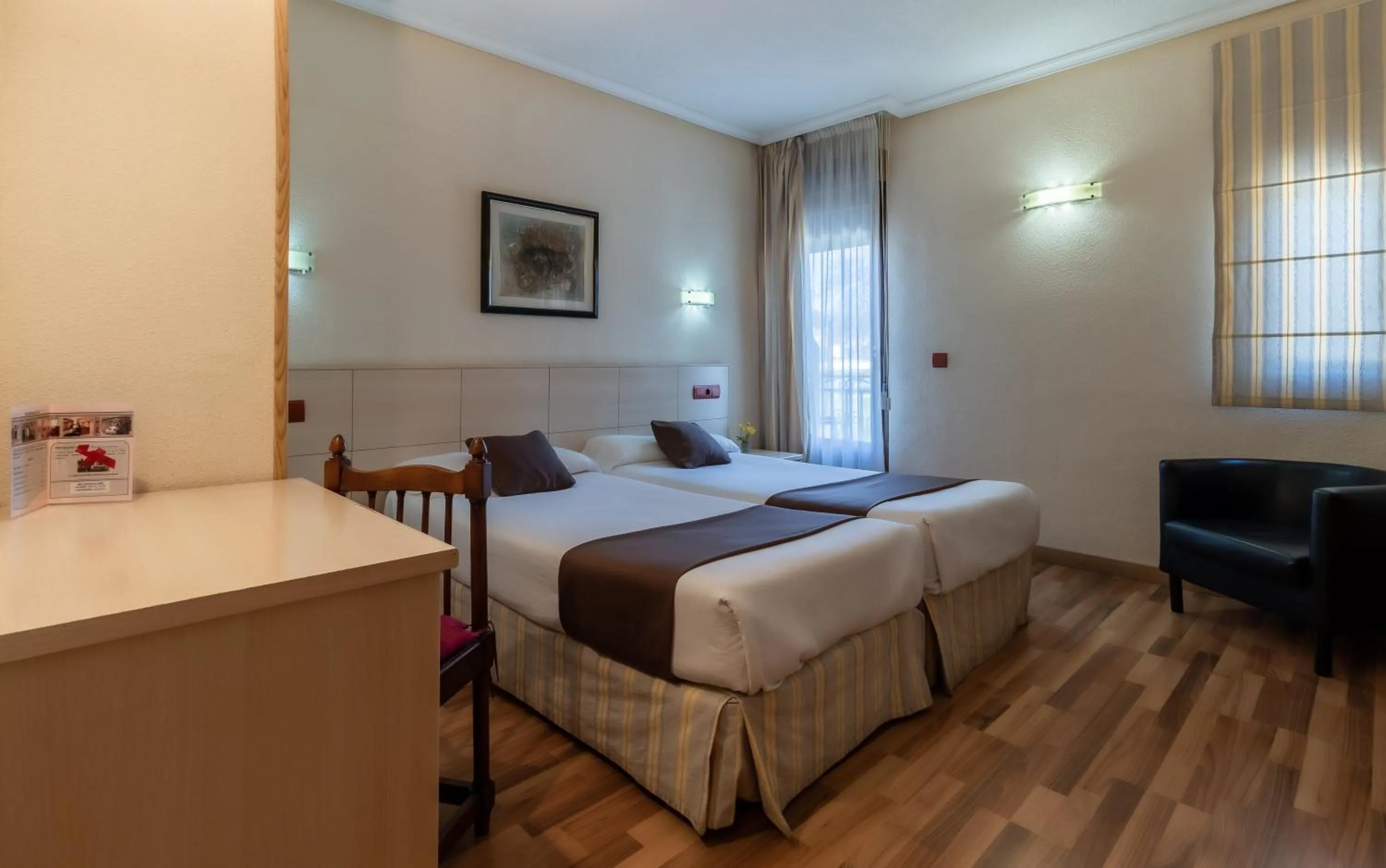 Photo of the whole room, Bed in Hostal Rural El Caño by Vivere Stays