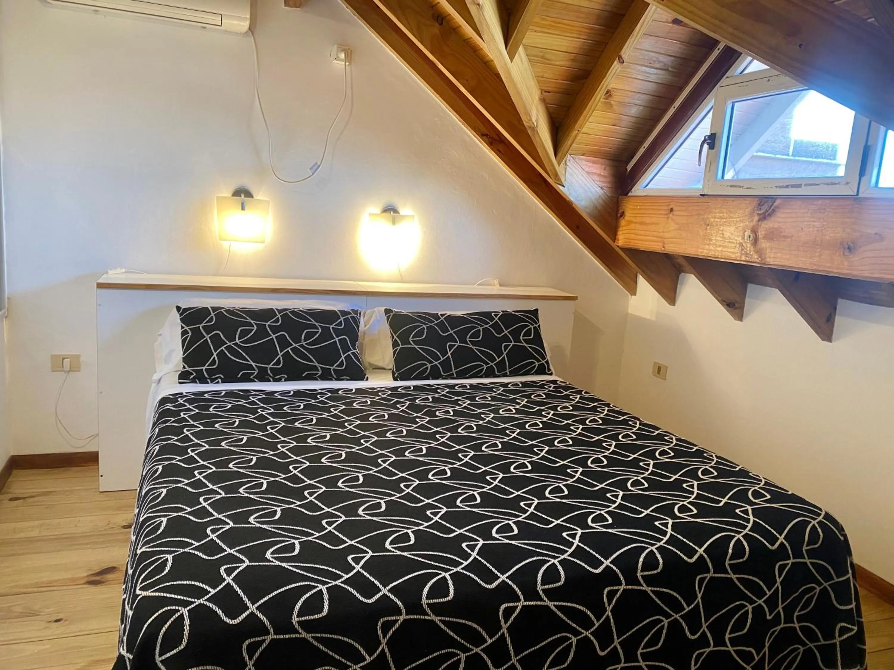 Bed in Apart & Hotel Neptuno