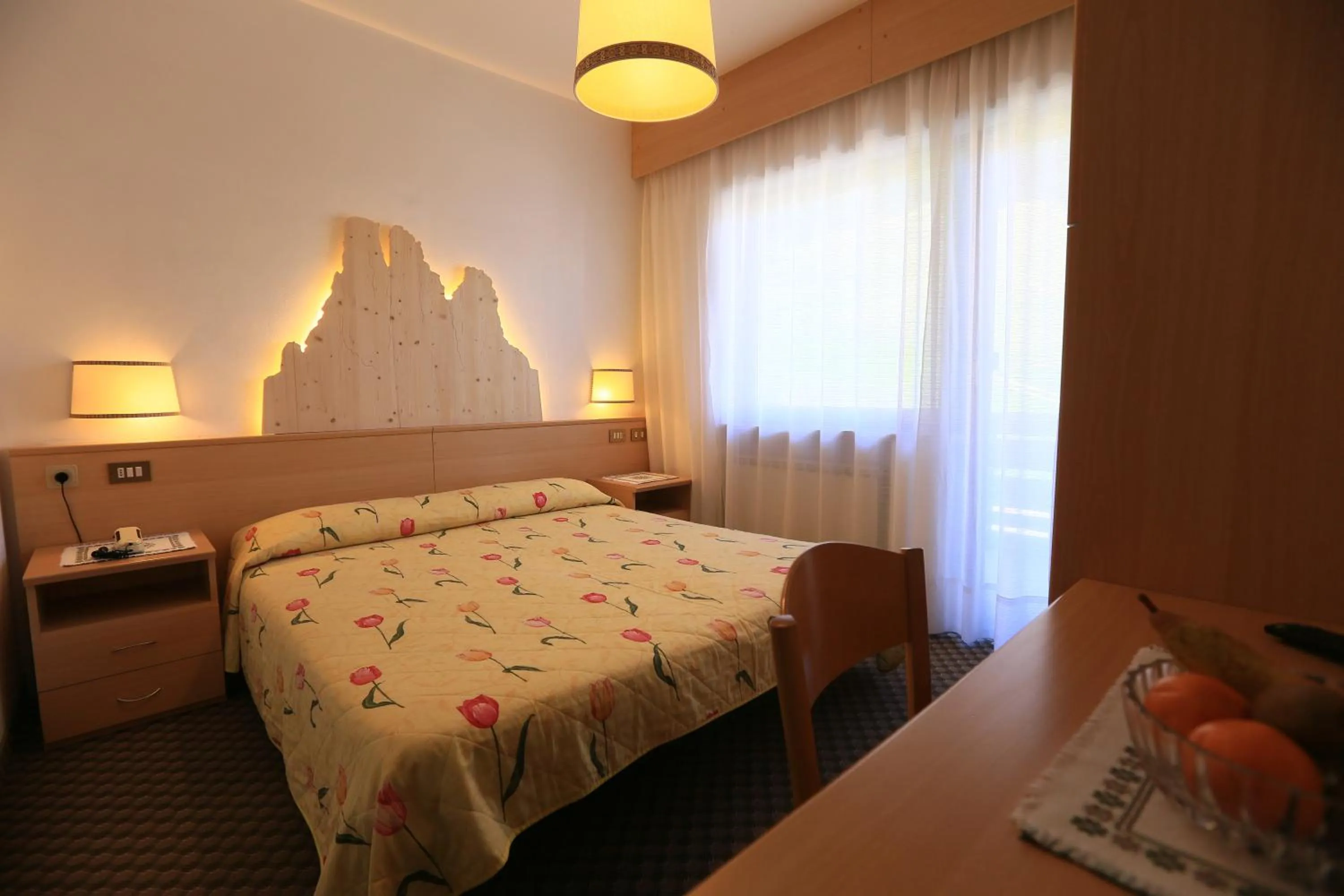 Bed in Hotel Miramonti