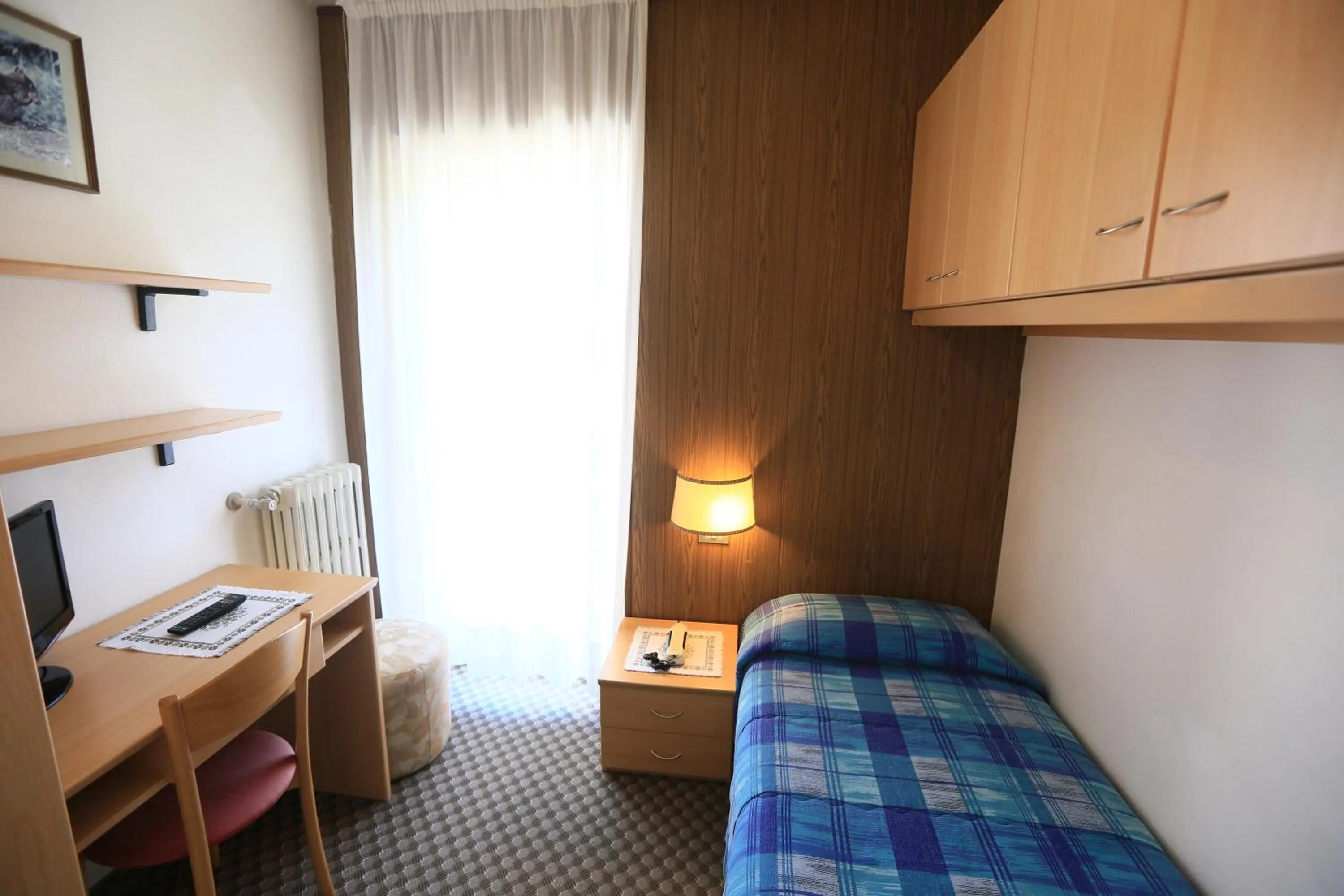 Bed in Hotel Miramonti