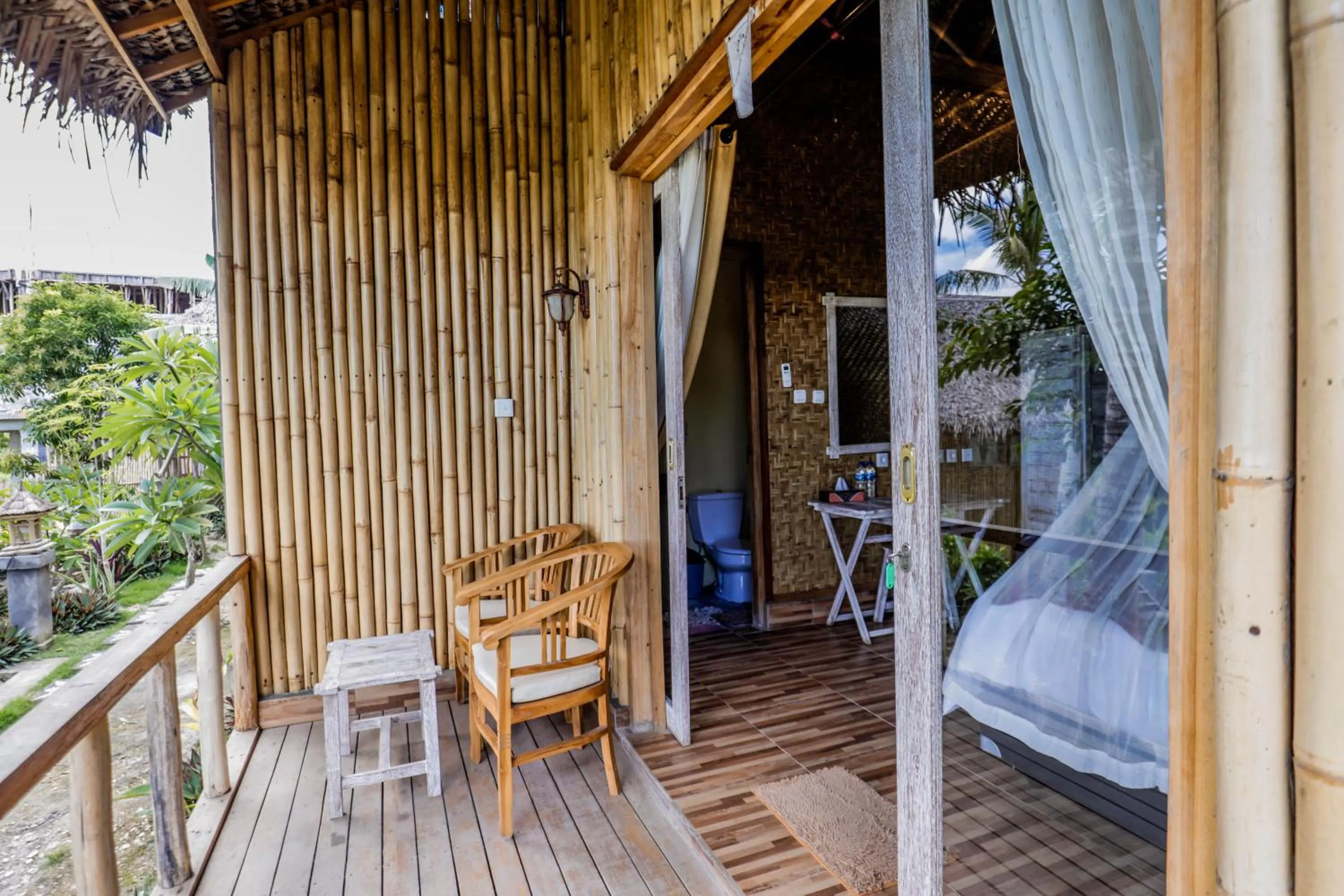 Balcony/Terrace in Atuh Forest Cottage