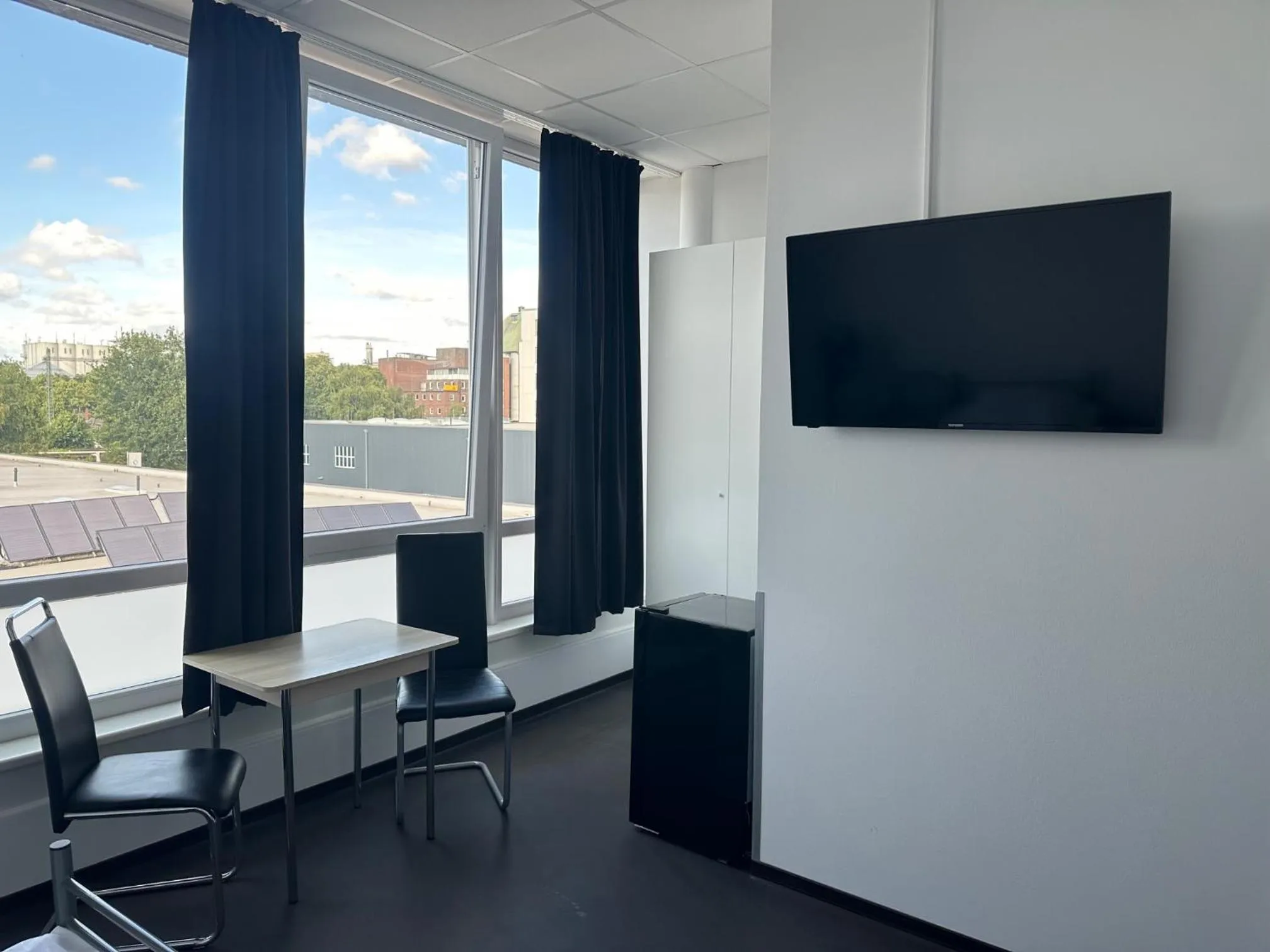 TV and multimedia in Arena Hostel & Monteurzimmer