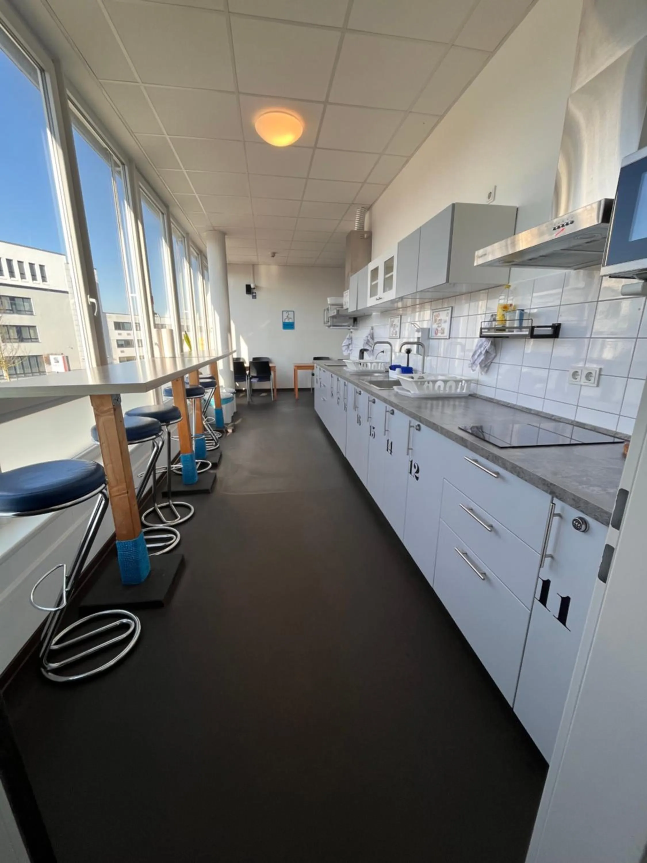 Kitchen or kitchenette in Arena Hostel & Monteurzimmer