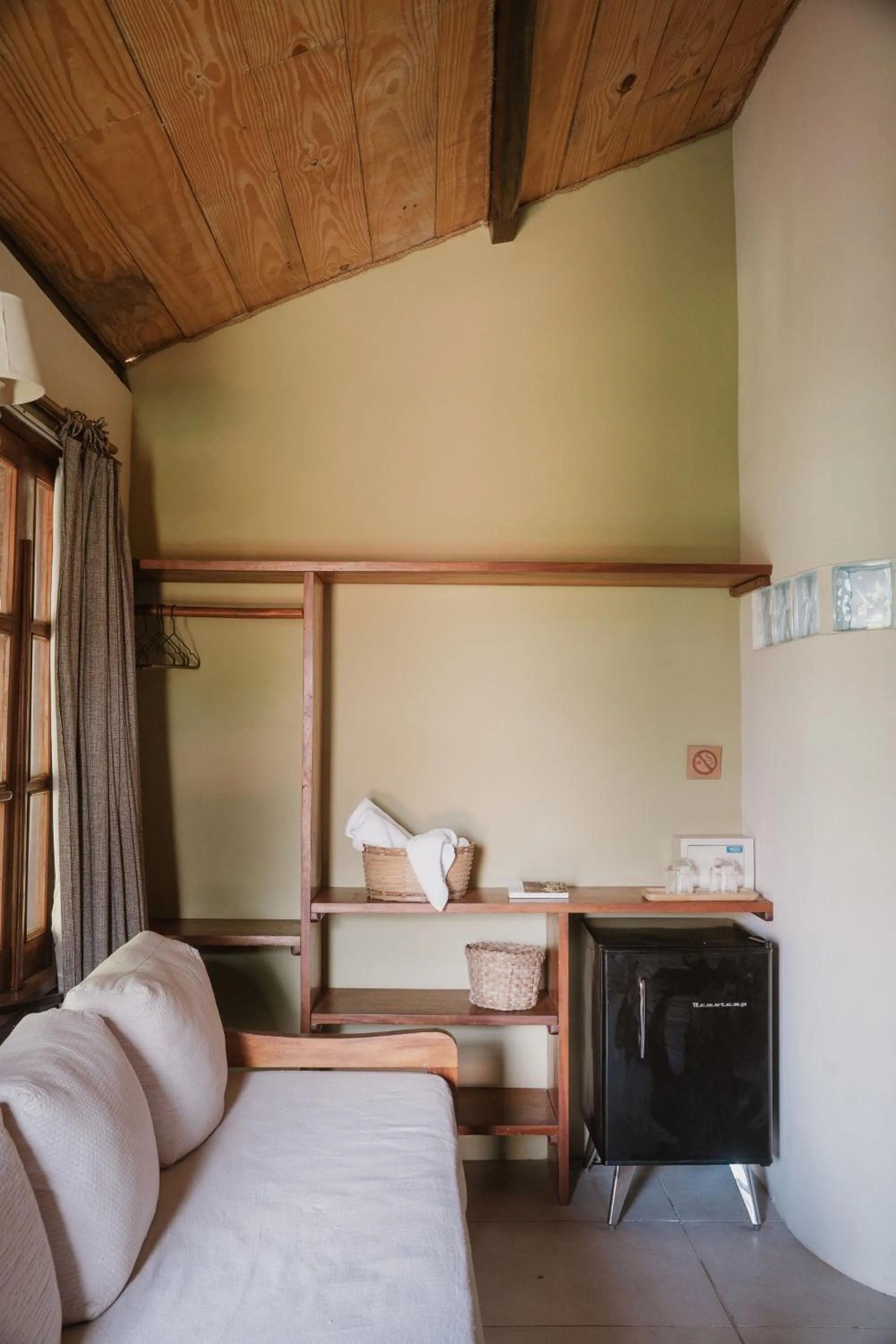 Living room, Bed in Pousada Fruta Pão