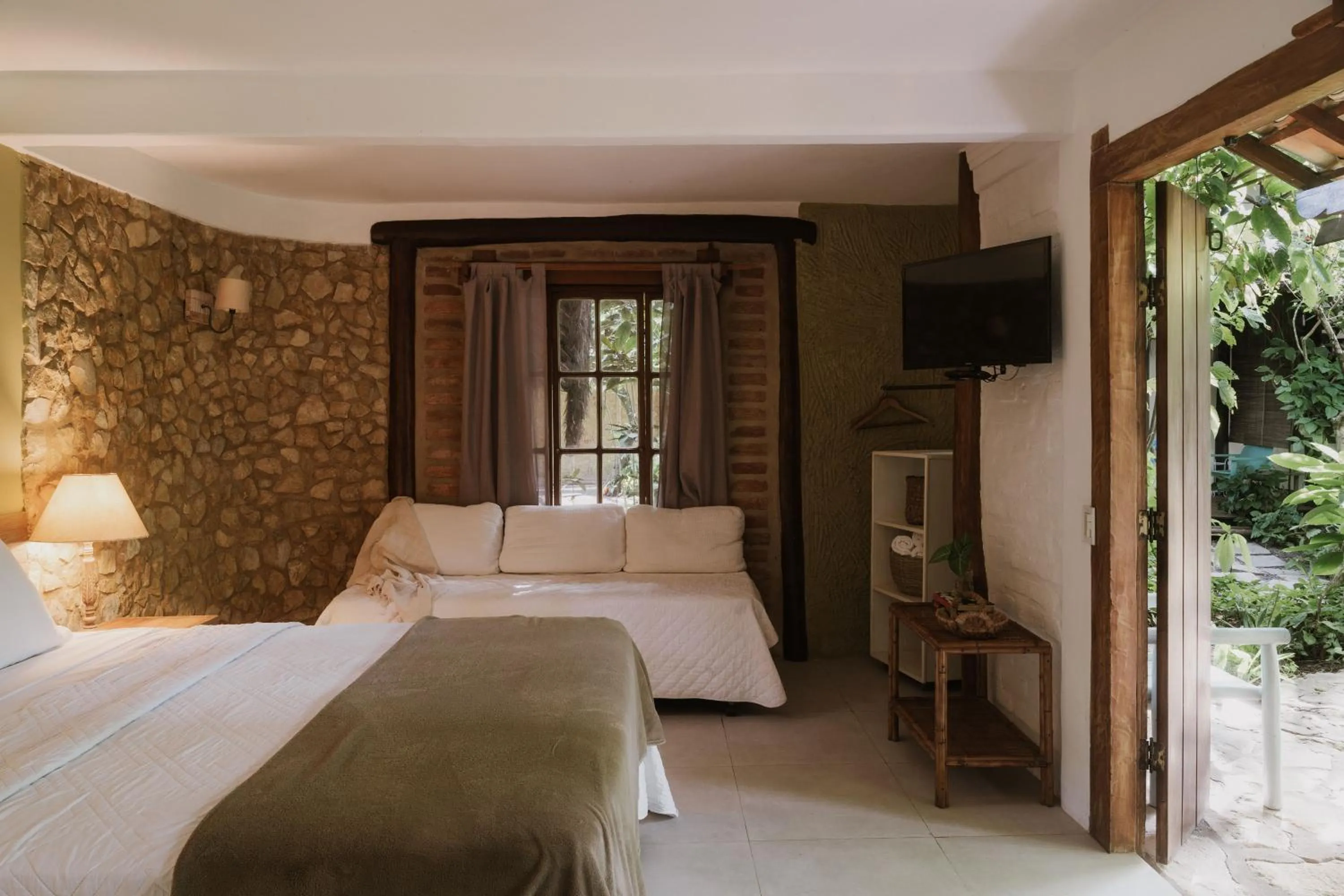 Photo of the whole room, Bed in Pousada Fruta Pão