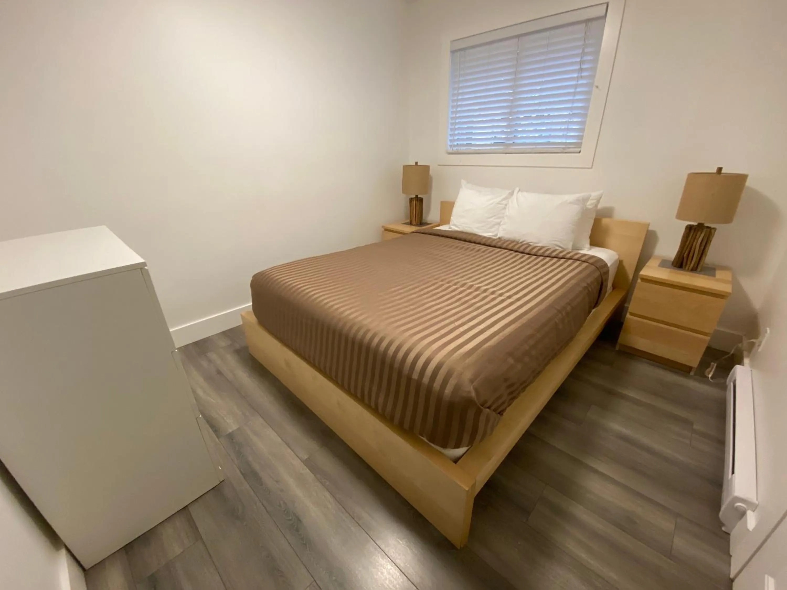 Bed in Riverside Resort & RV Park