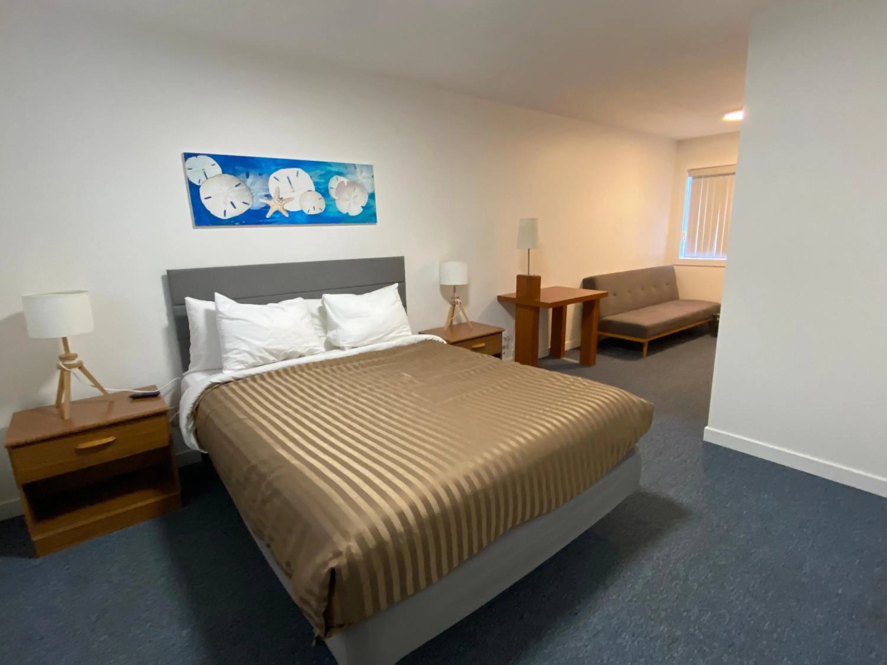 Bed in Riverside Resort & RV Park