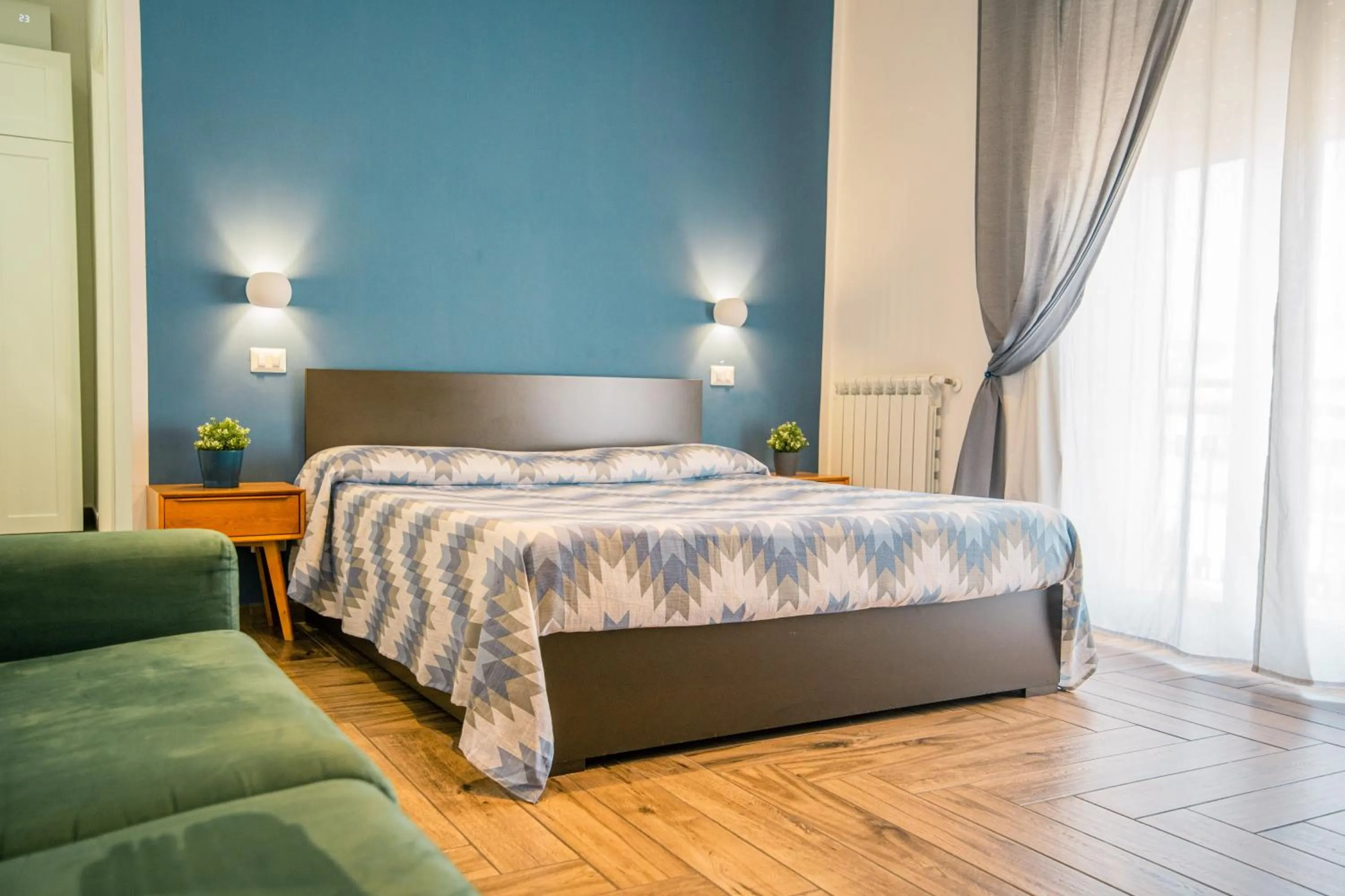 Photo of the whole room, Bed in HUB FERROVIARIO - 12 Posti Letto per il Tuo Gruppo a Napoli con Wifi e Netflix
