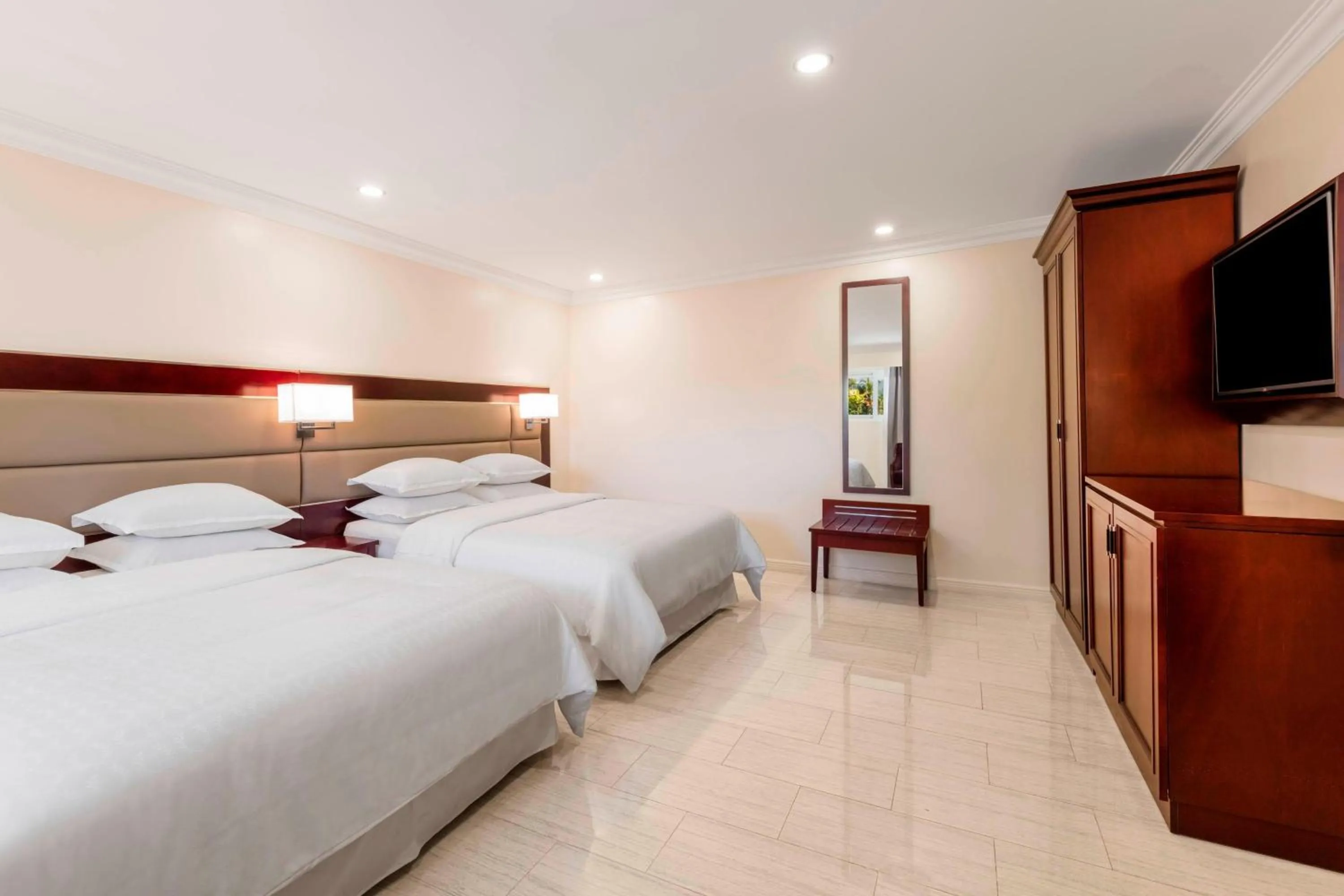 Photo of the whole room, Bed in Sheraton Samoa Aggie Grey's Hotel & Bungalows