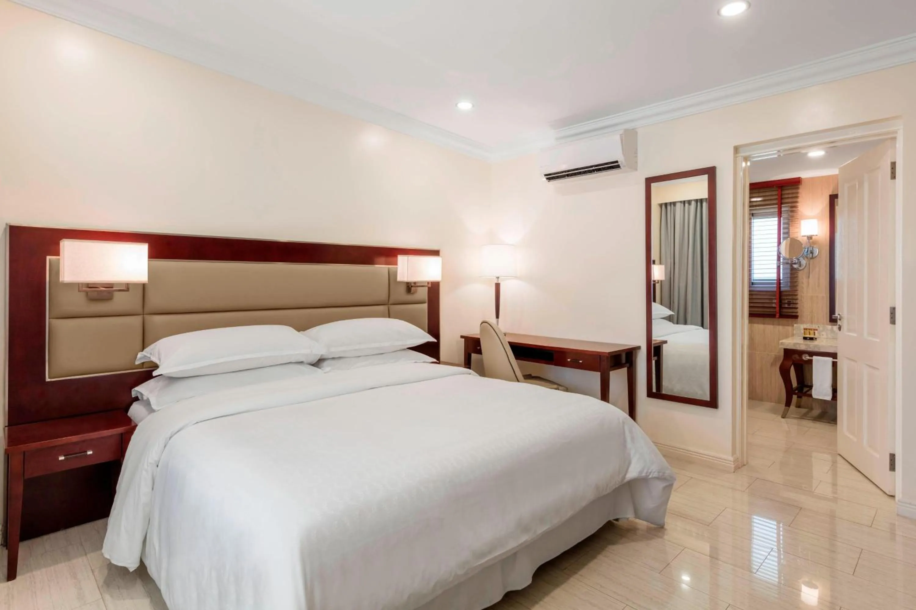 Photo of the whole room, Bed in Sheraton Samoa Aggie Grey's Hotel & Bungalows