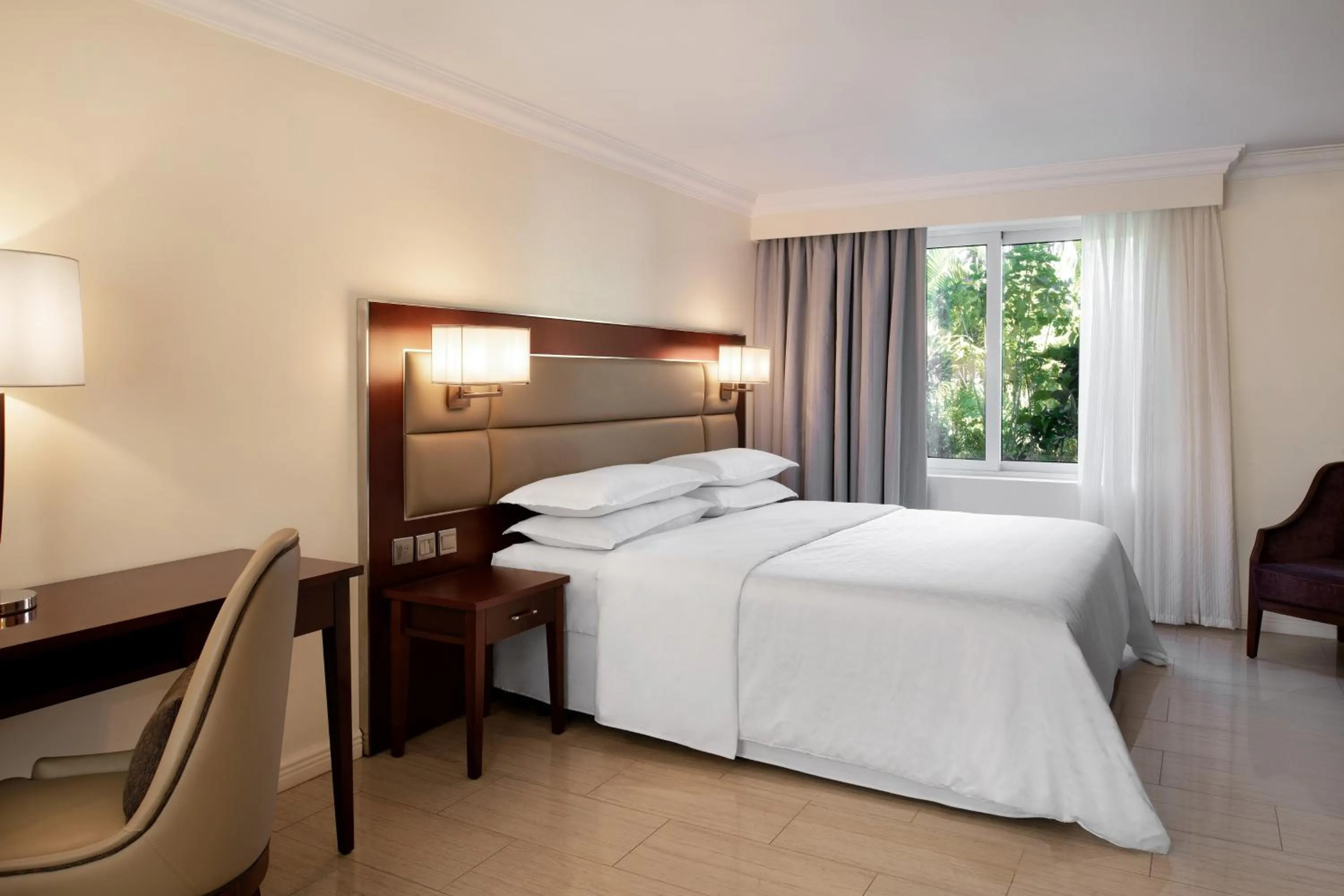 Photo of the whole room, Bed in Sheraton Samoa Aggie Grey's Hotel & Bungalows