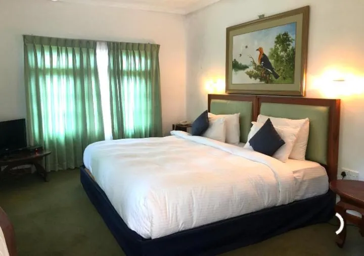Bedroom, Bed in Tea Bush Hotel