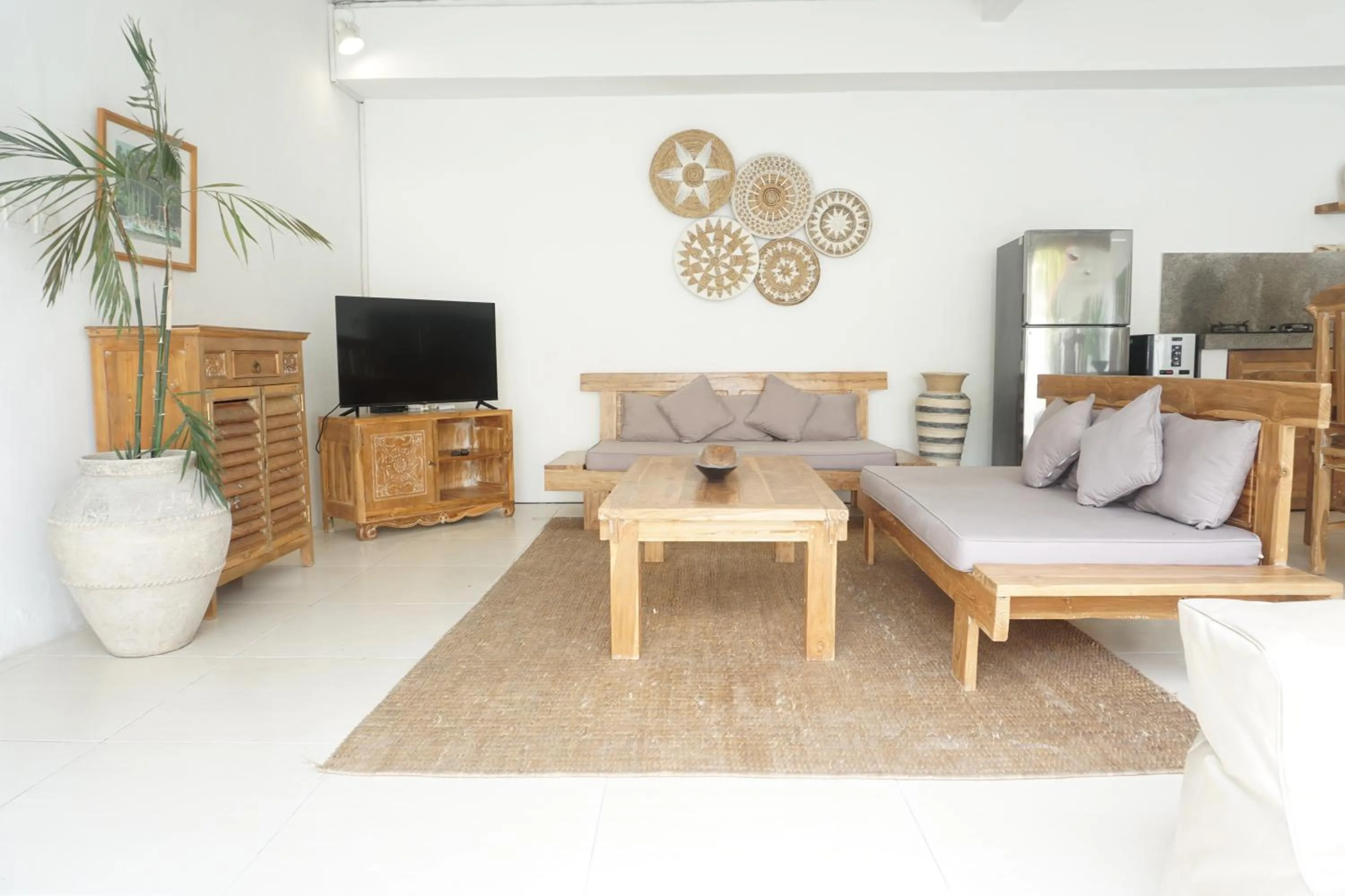 Communal lounge/ TV room in Villa Pagu