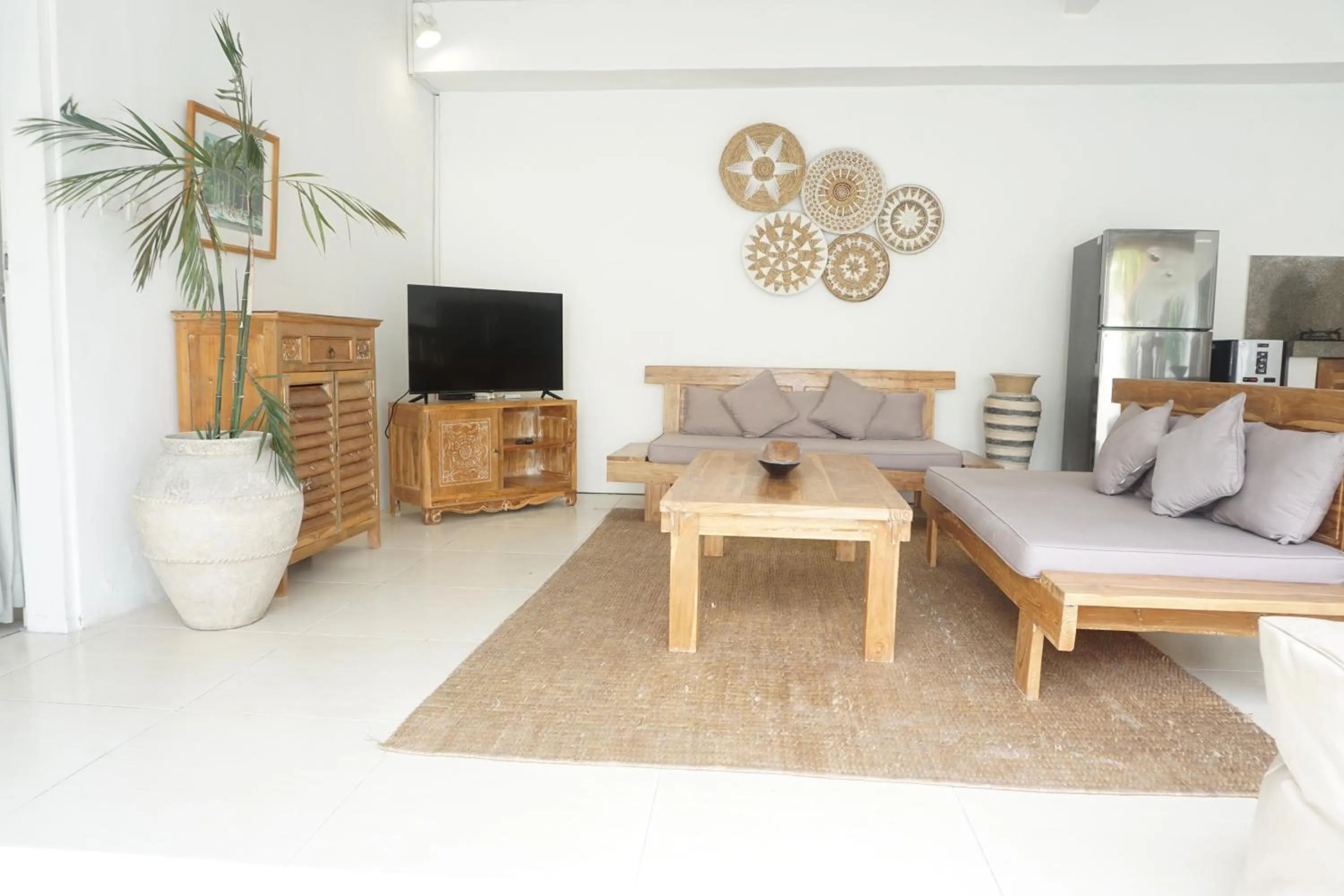 Communal lounge/ TV room in Villa Pagu