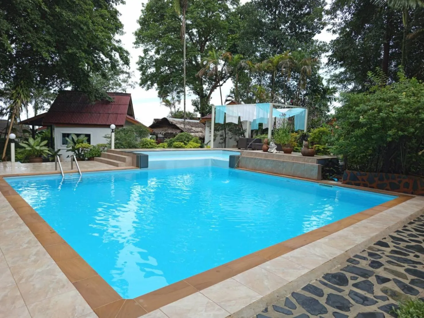 Swimming pool in Faye Orchid Garden Resort