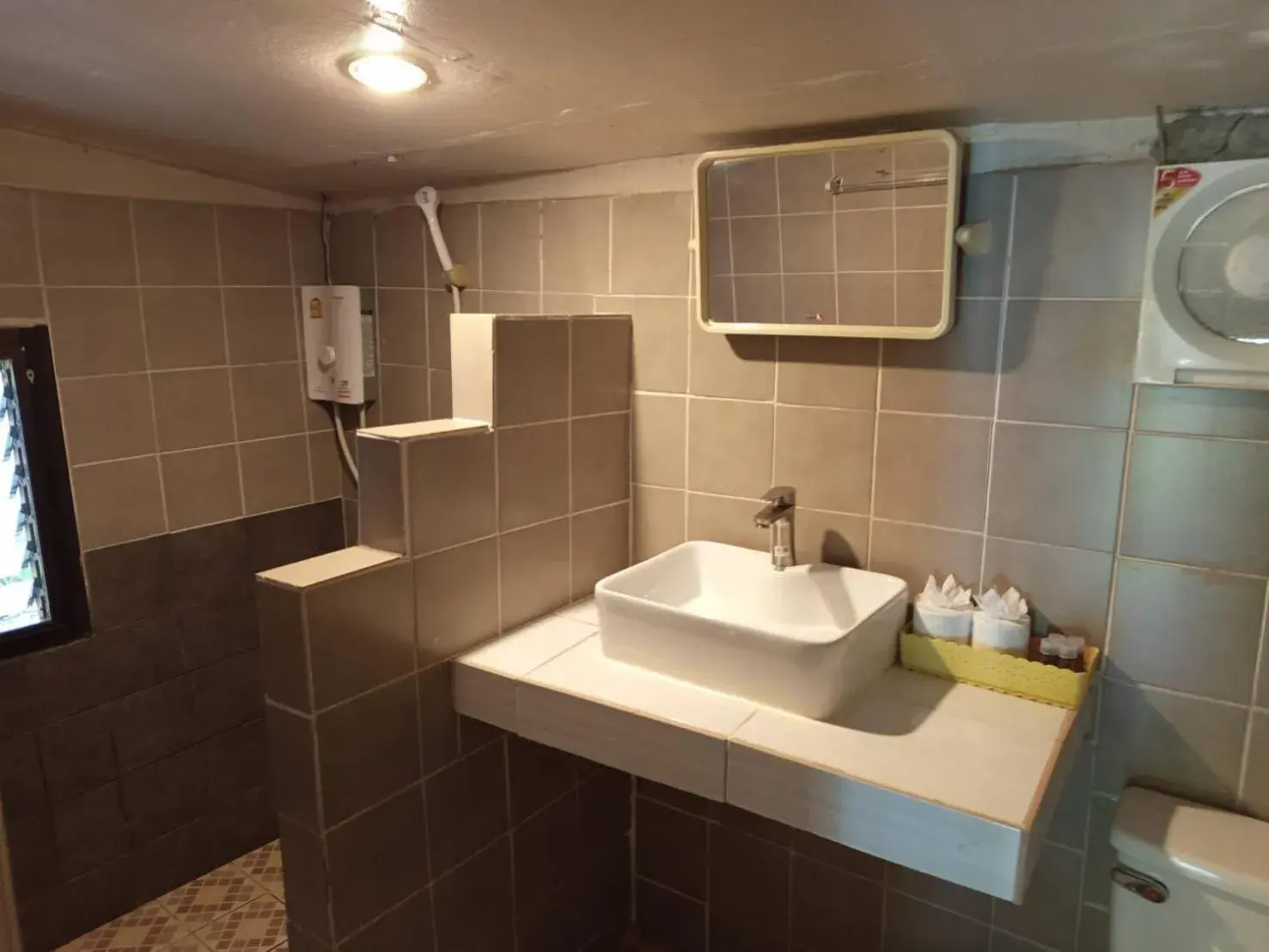 Bathroom in Faye Orchid Garden Resort Bathroom in Faye Orchid Garden Resort