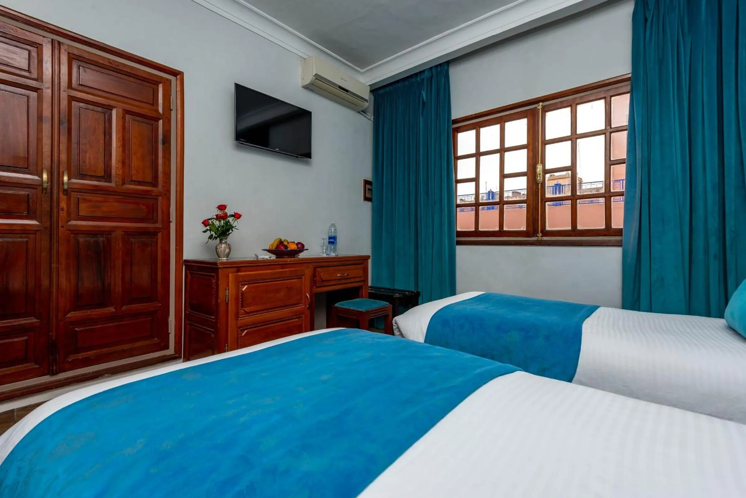 Communal lounge/ TV room, Bed in Hotel Oudaya & Spa