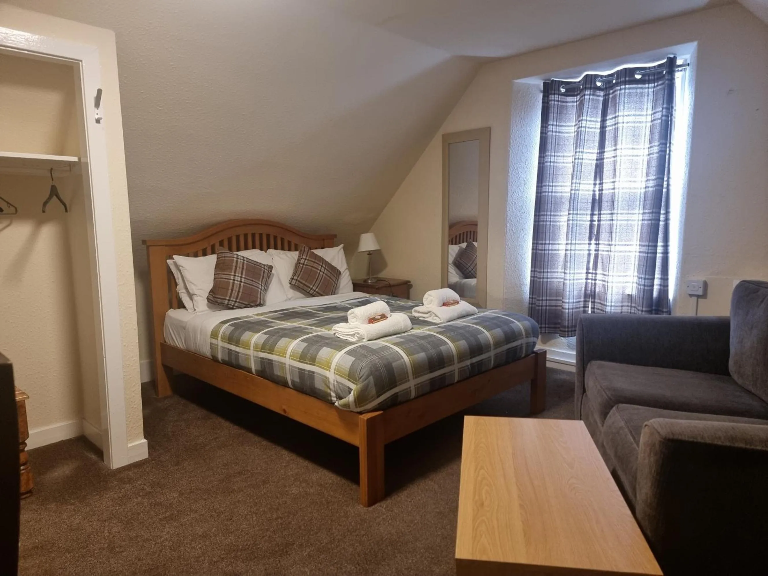 Bedroom in Roy Bridge Hotel