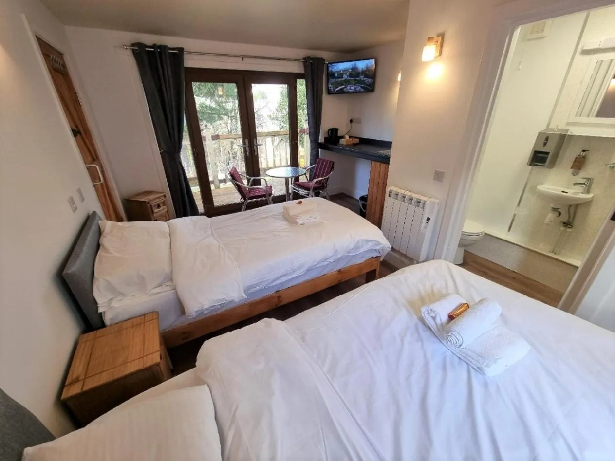 Bedroom in Roy Bridge Hotel