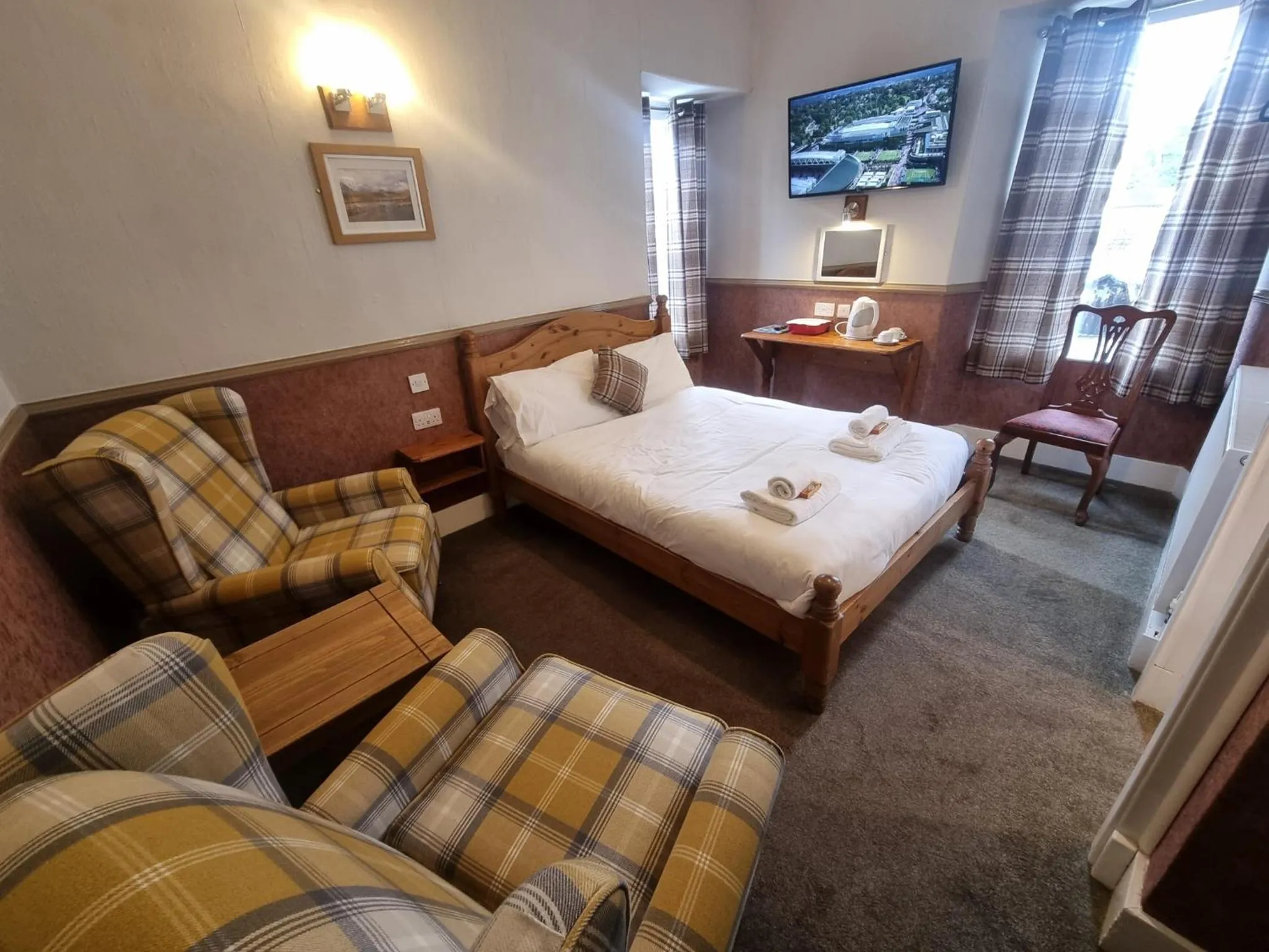 Bedroom in Roy Bridge Hotel