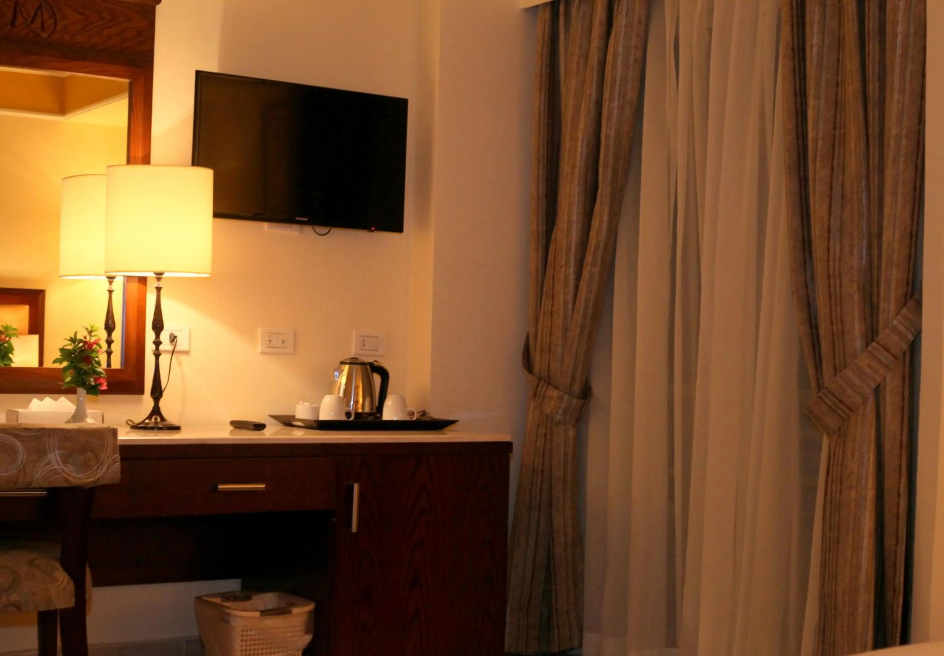 TV and multimedia in MinaMark Beach Resort for Families and Couples Only